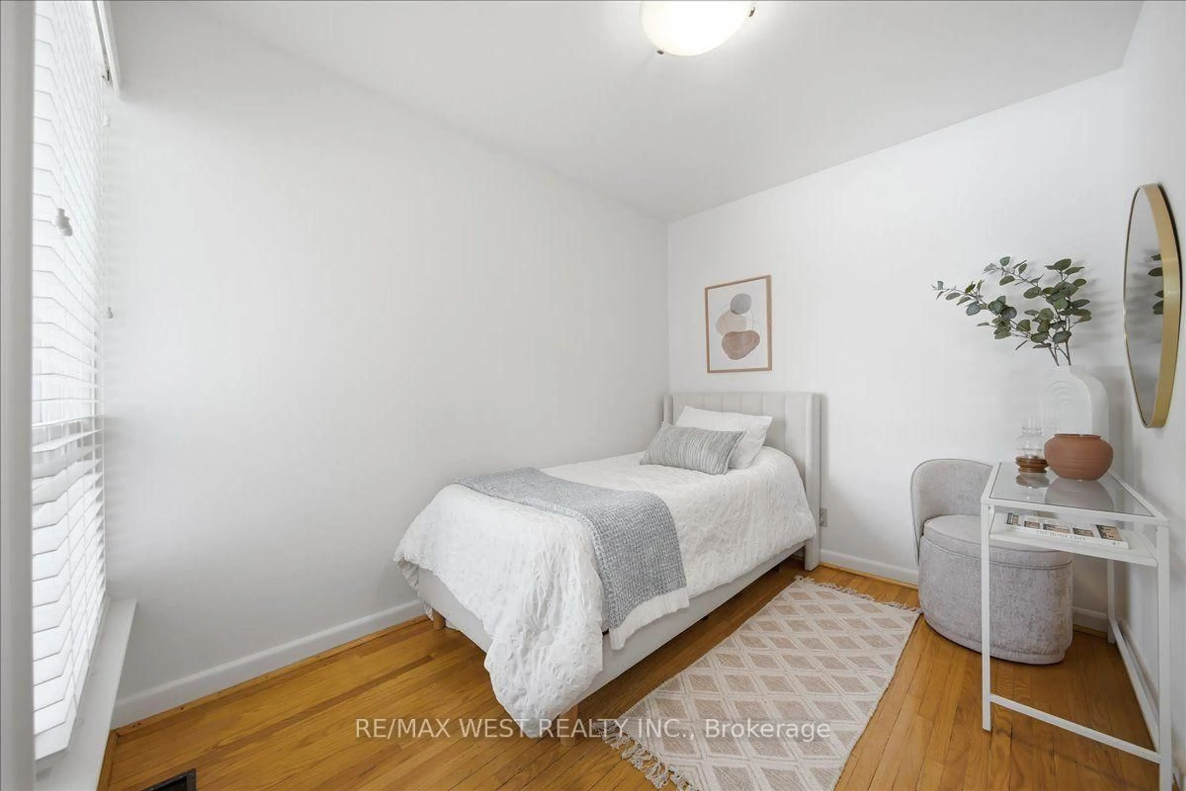 Bedroom with bed, unknown for 19 Decarie Circ, Toronto Ontario M9B 3H6
