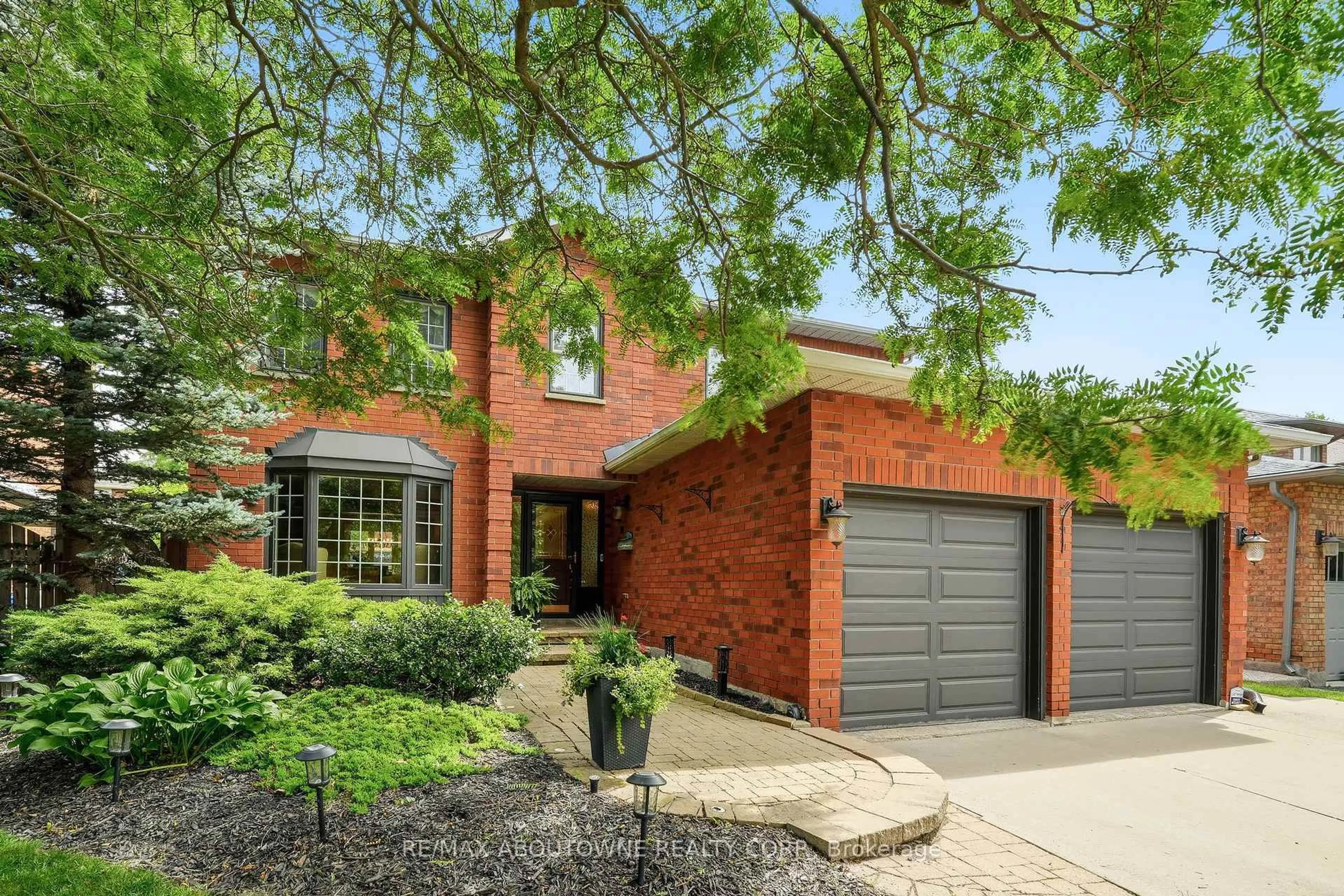 Home with brick exterior material, street for 89 Waldie Rd, Oakville Ontario L6L 6G5