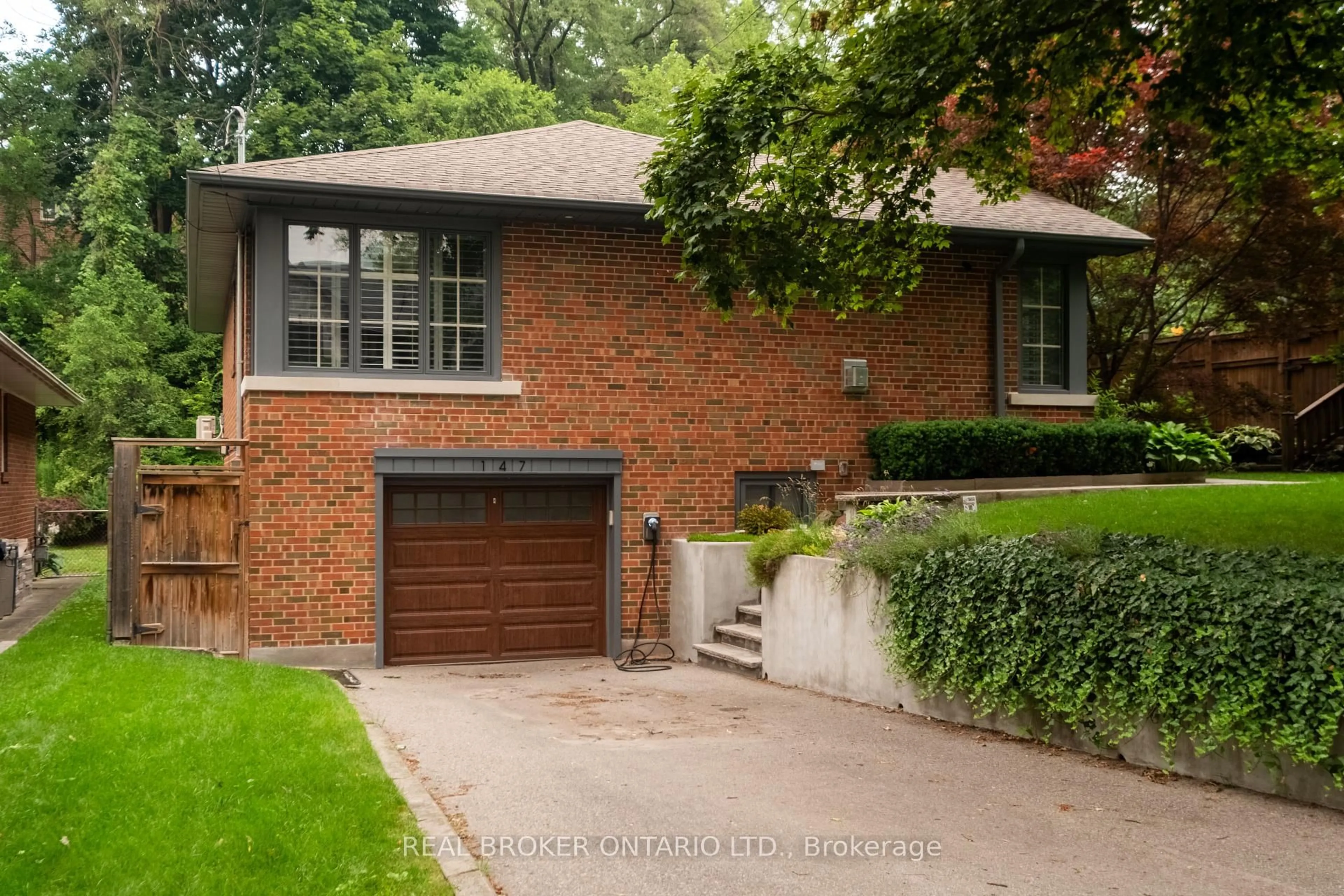 Home with brick exterior material, street for 147 Thompson Ave, Toronto Ontario M8Z 3V1