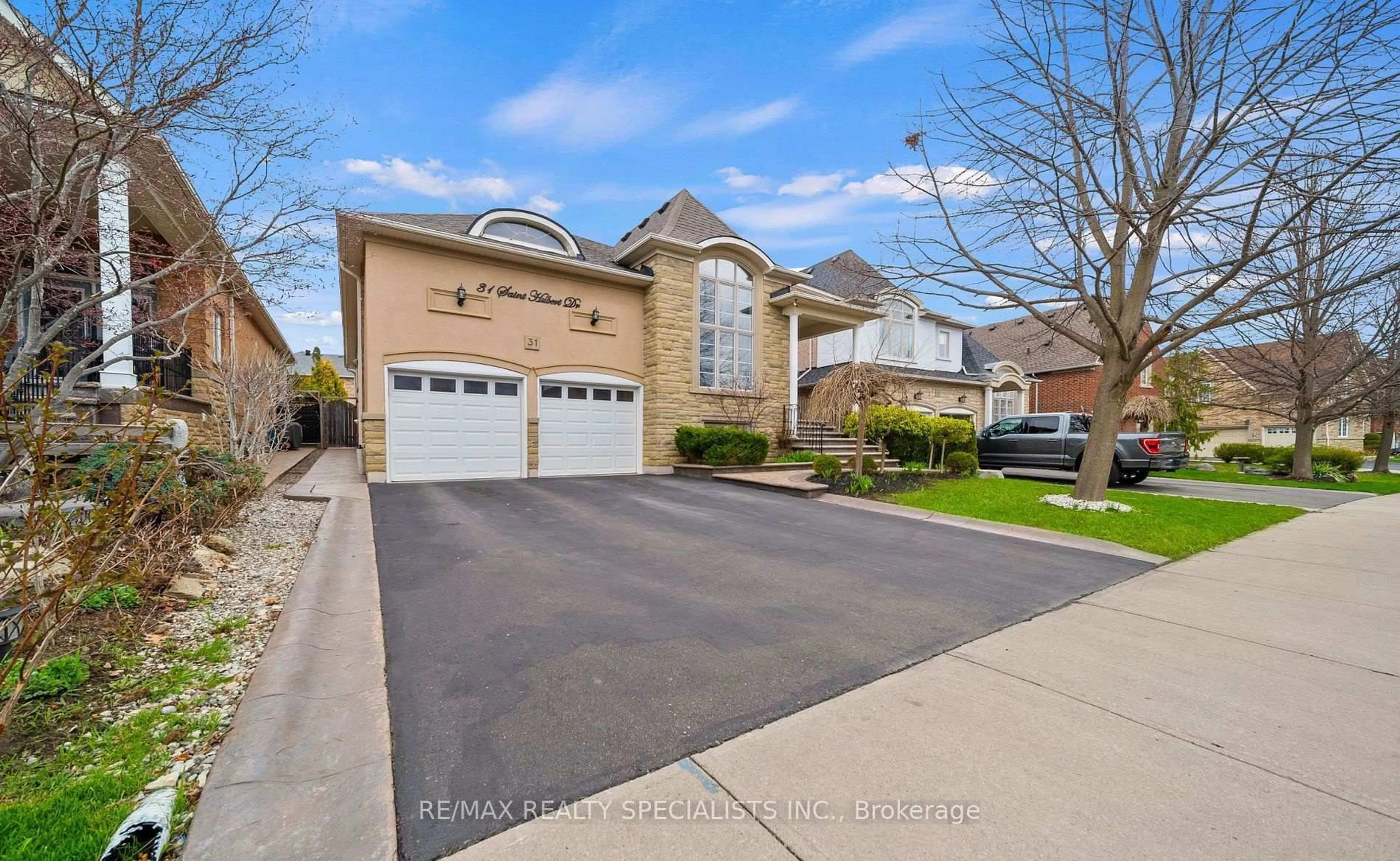 Home with brick exterior material, street for 31 Saint Hubert Dr, Brampton Ontario L6P 1W1