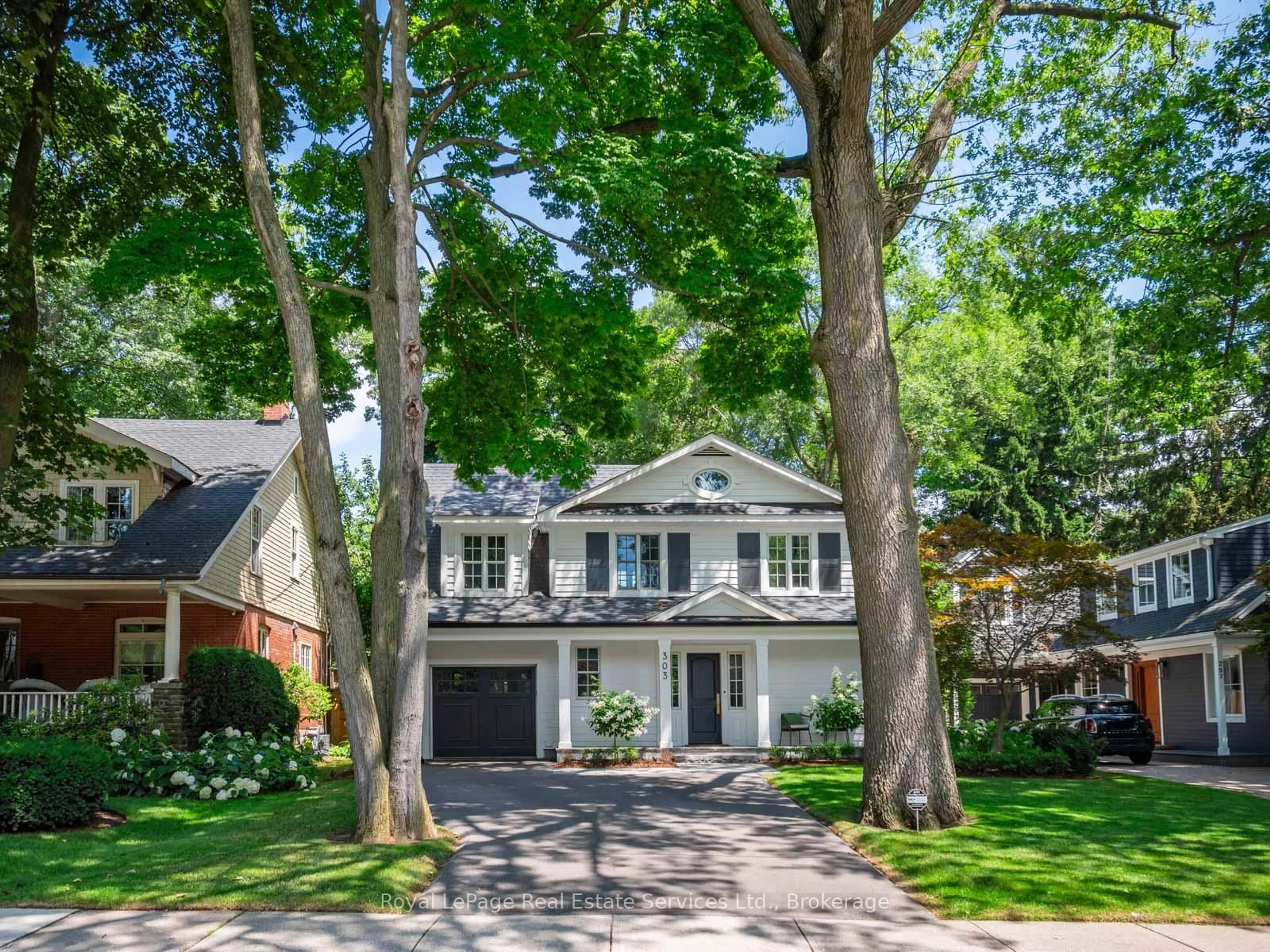 Home with brick exterior material, street for 303 Watson Ave, Oakville Ontario L6J 3V3