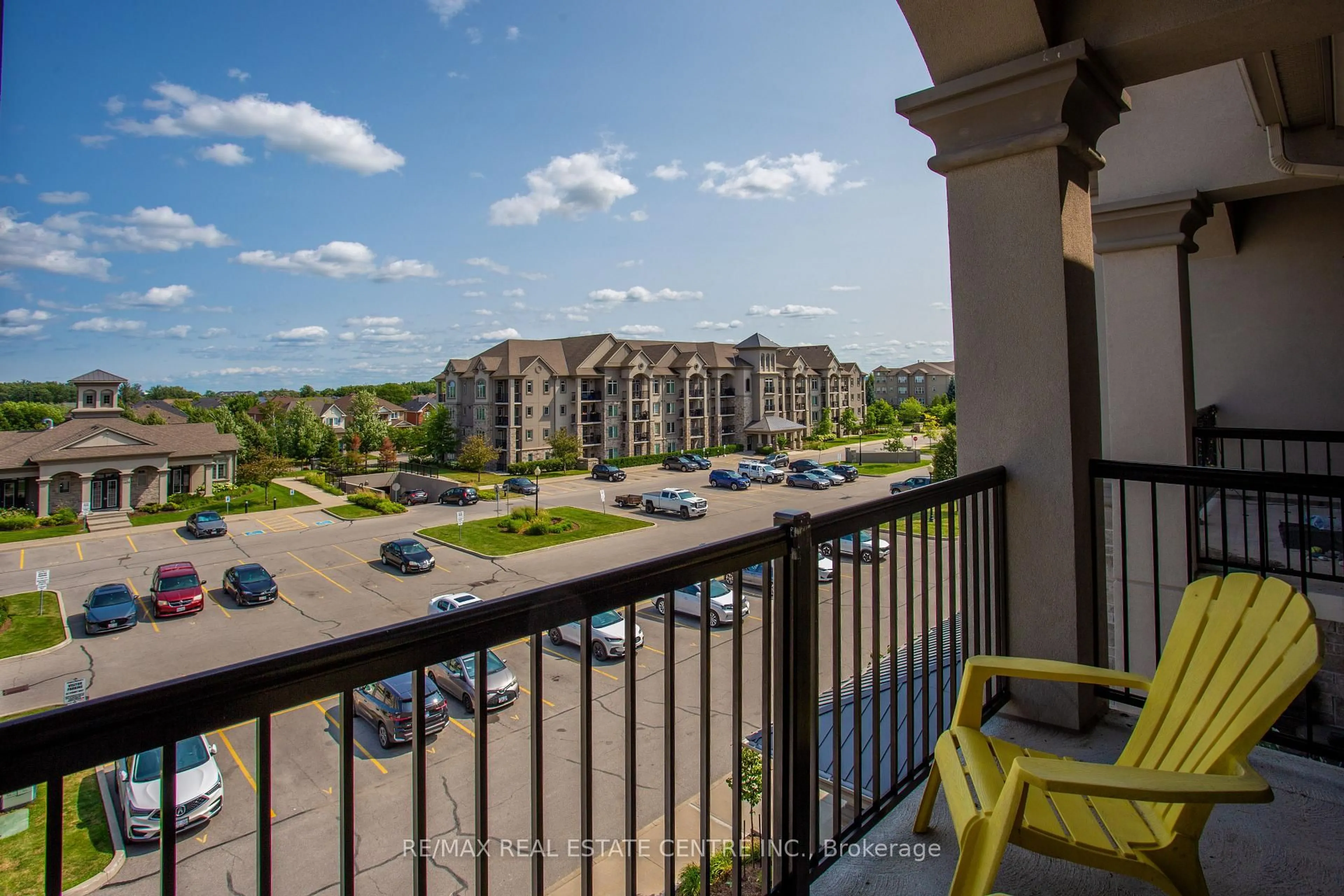 Patio, city buildings view from balcony for 1460 Main St #412, Milton Ontario L9T 8W5