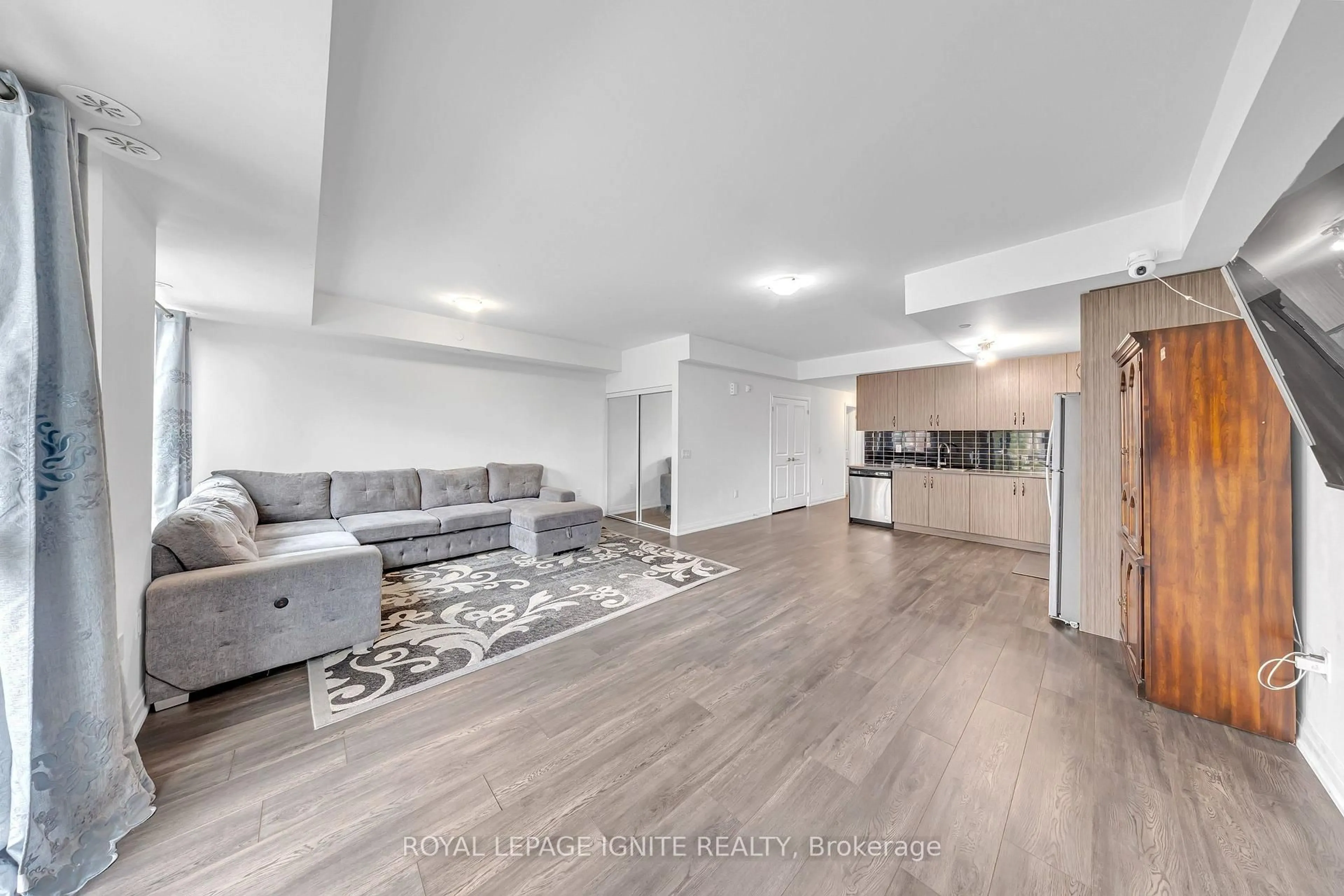Living room with furniture, unknown for 65 Attmar Dr #152, Brampton Ontario L6P 0Y6