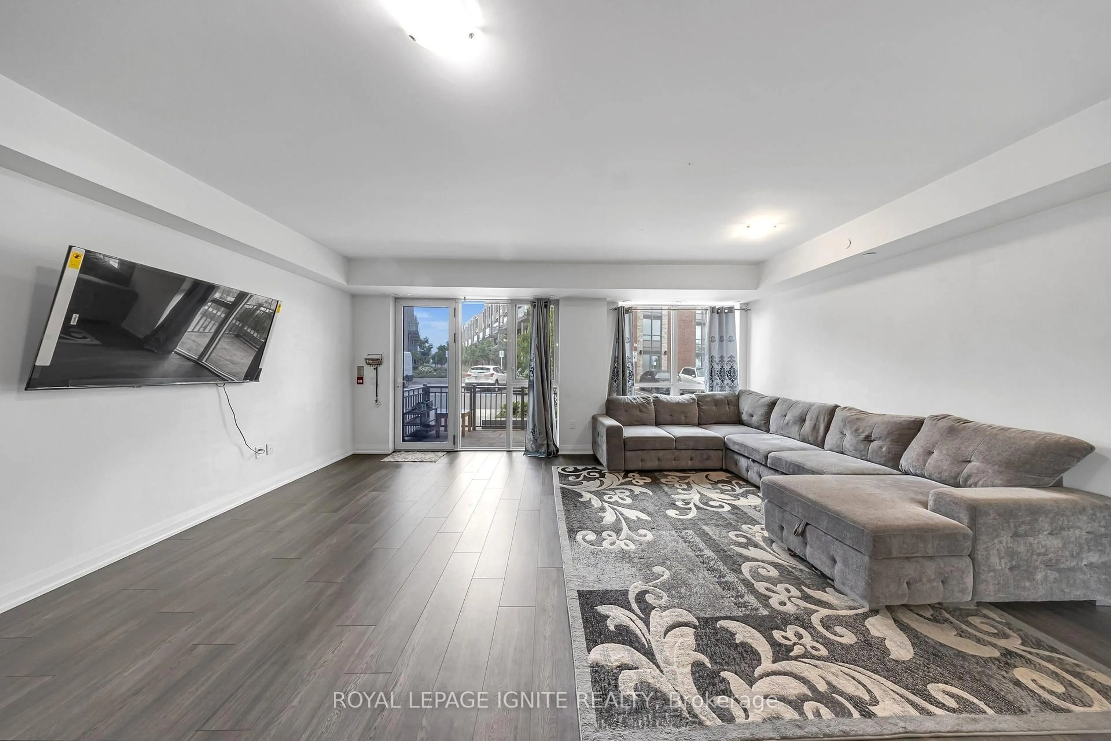 Living room with furniture, unknown for 65 Attmar Dr #152, Brampton Ontario L6P 0Y6