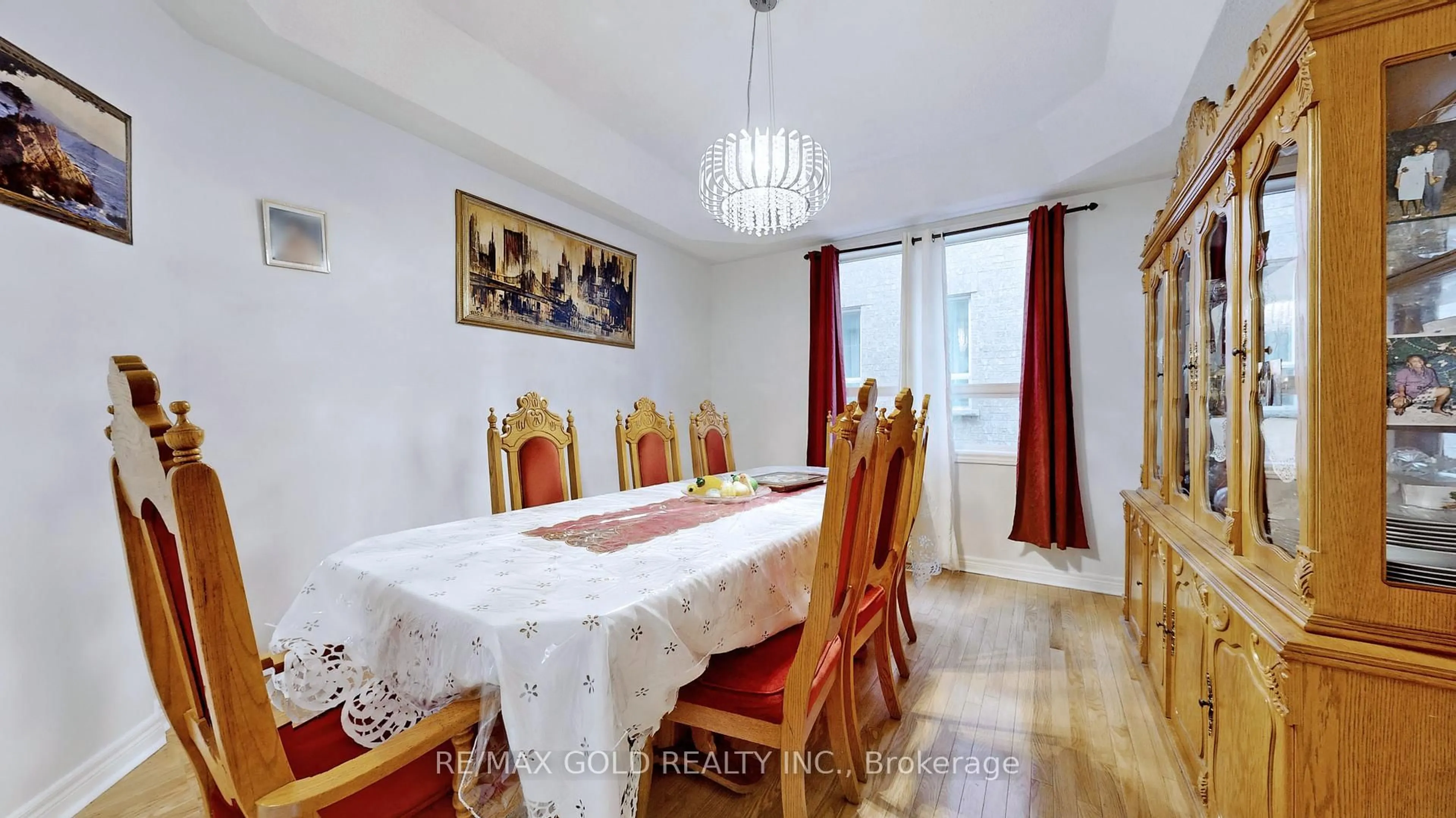 Dining room, wood/laminate floor for 64 Prue Crt, Brampton Ontario L6P 1P8