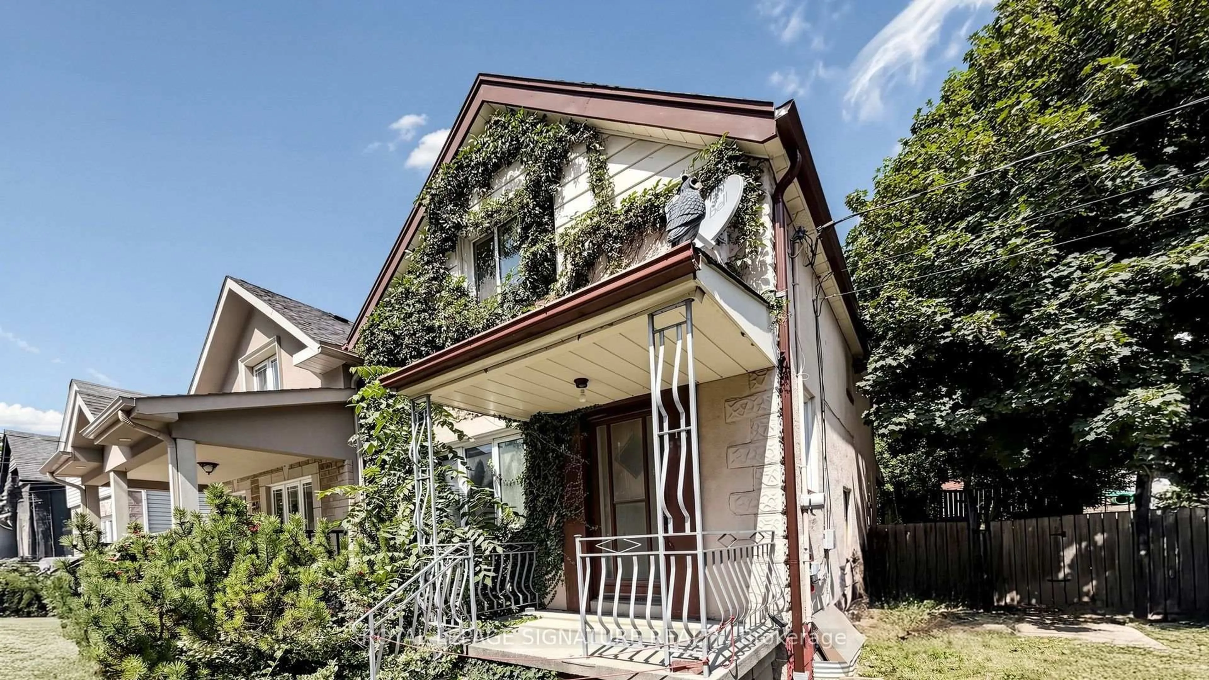 Home with brick exterior material, street for 18 Dunraven Dr, Toronto Ontario M6M 1H1