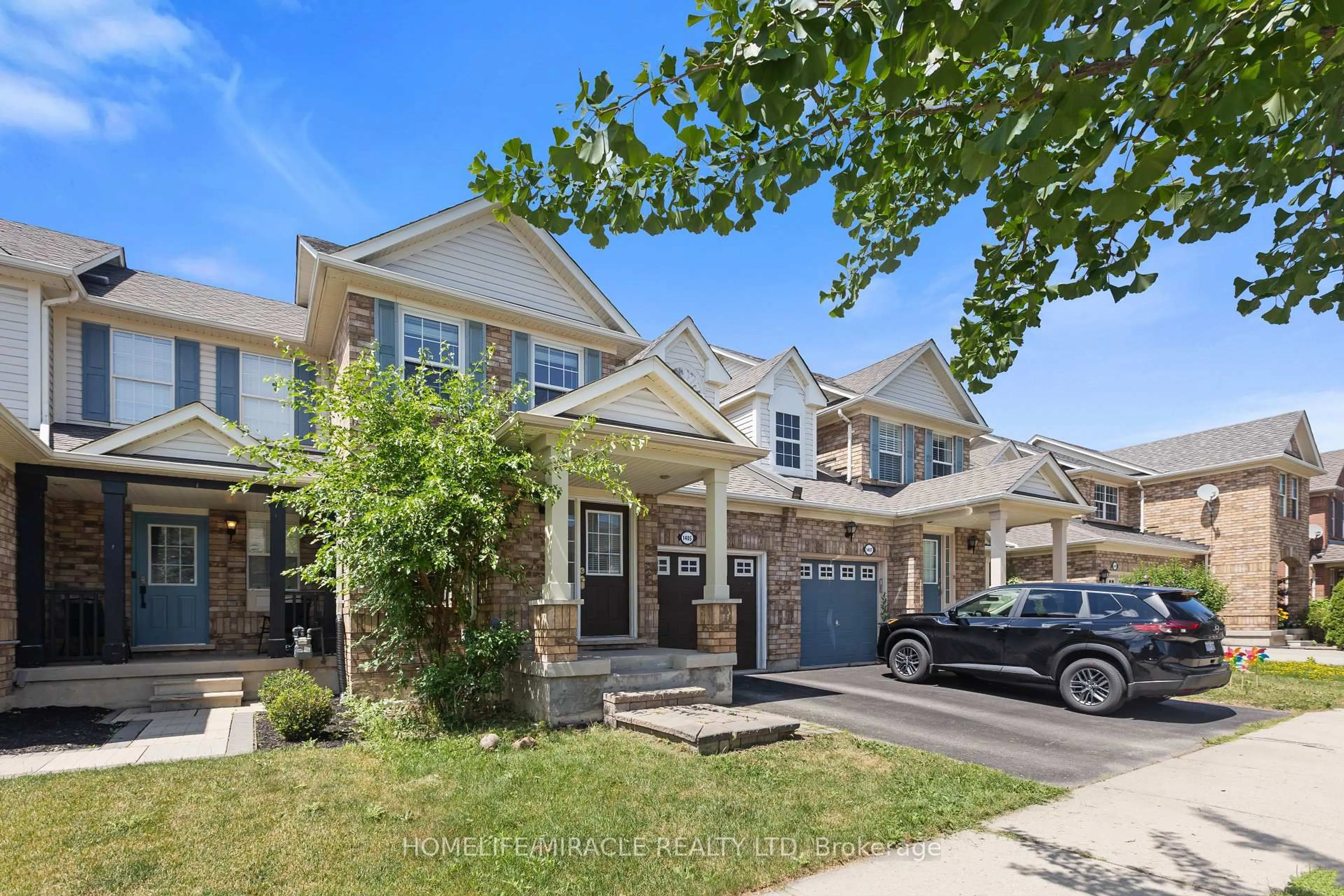 Home with brick exterior material, street for 1405 MCDERMOTT Way #1405, Milton Ontario L9T 6L6