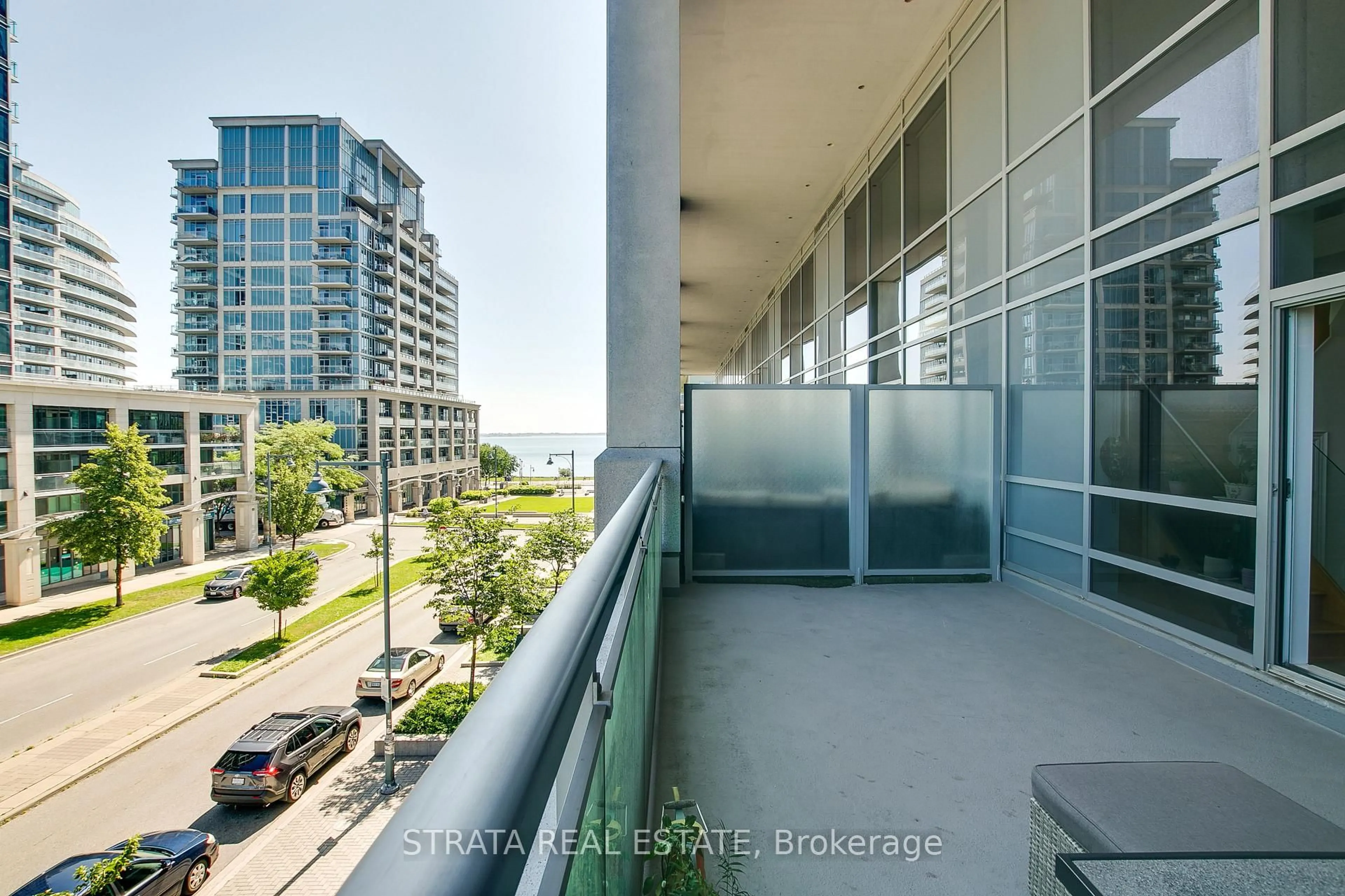 Balcony in the apartment, city buildings view from balcony for 16 Brookers Lane #206, Toronto Ontario M8V 0A5
