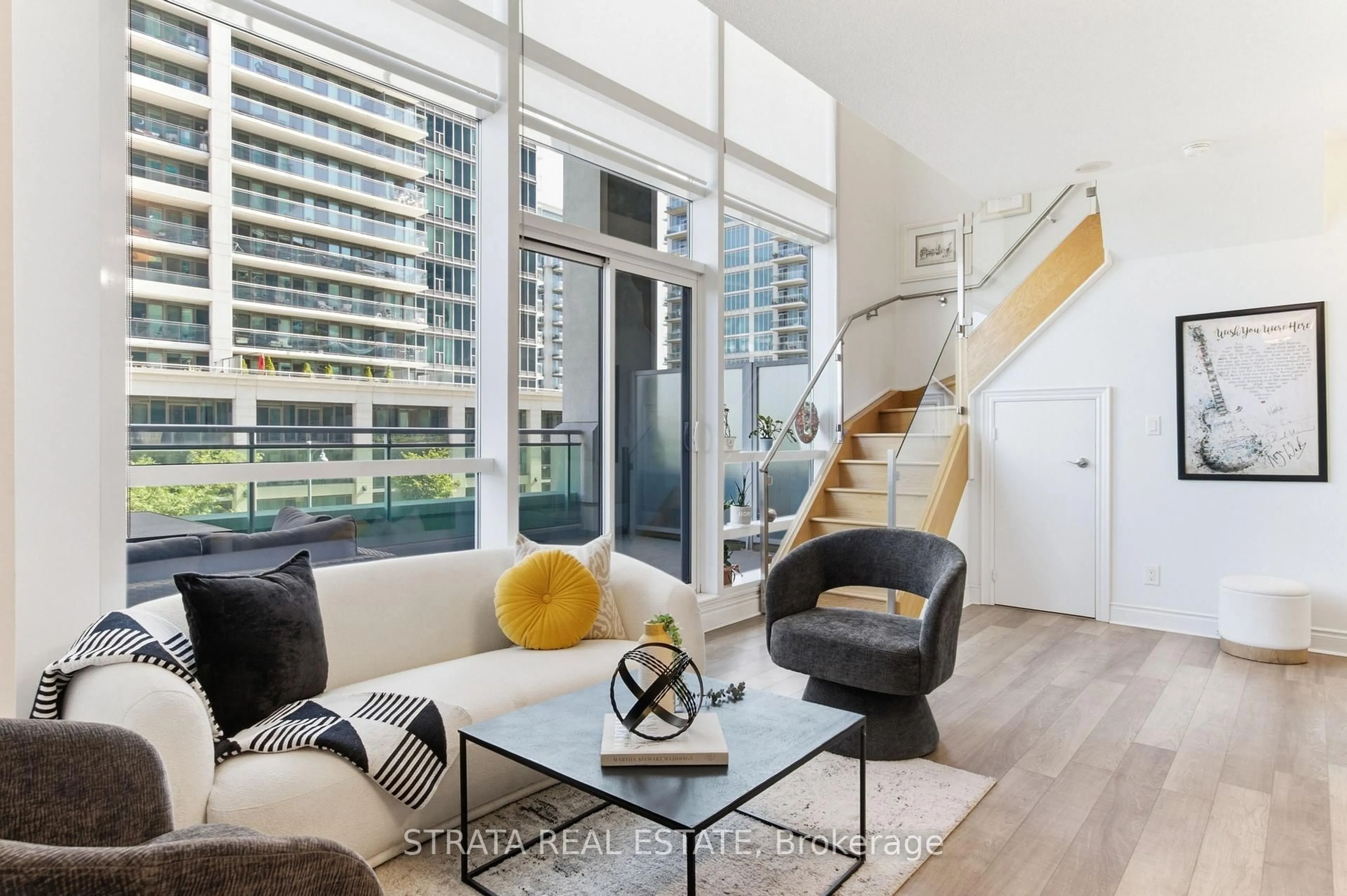 Living room with furniture, unknown for 16 Brookers Lane #206, Toronto Ontario M8V 0A5