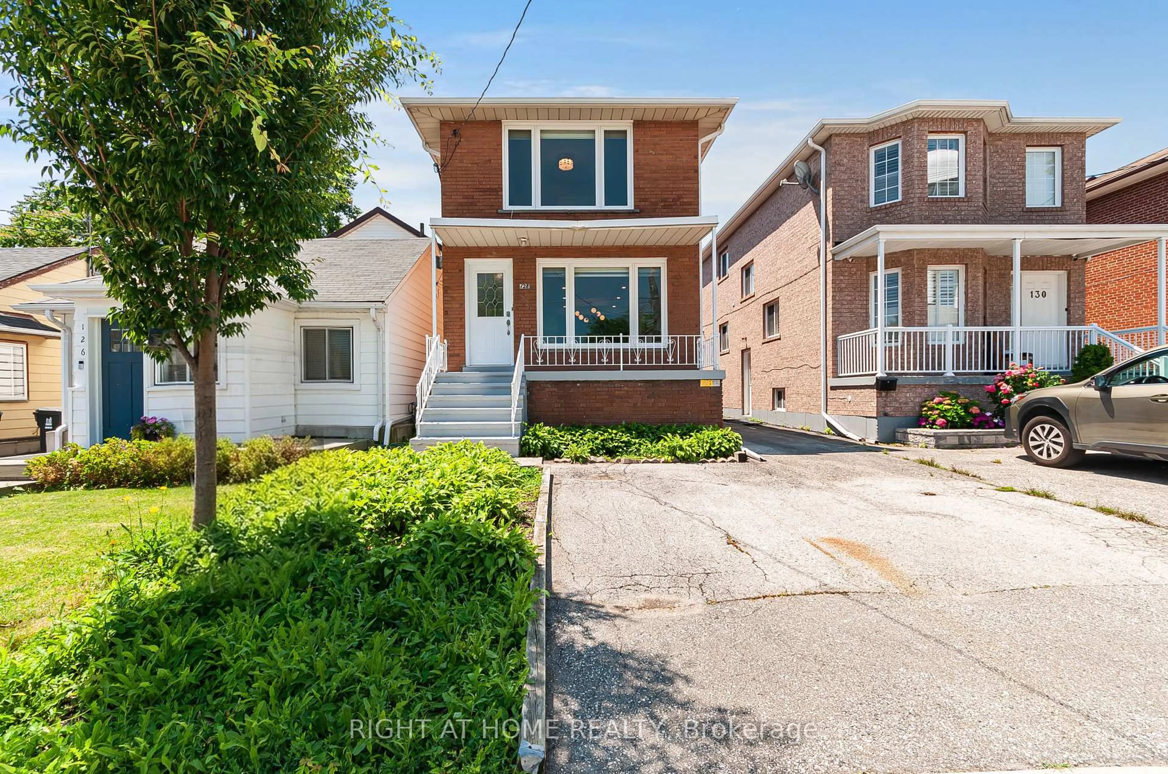 Home with brick exterior material, street for 128 Twenty Second St, Toronto Ontario M8V 3M4