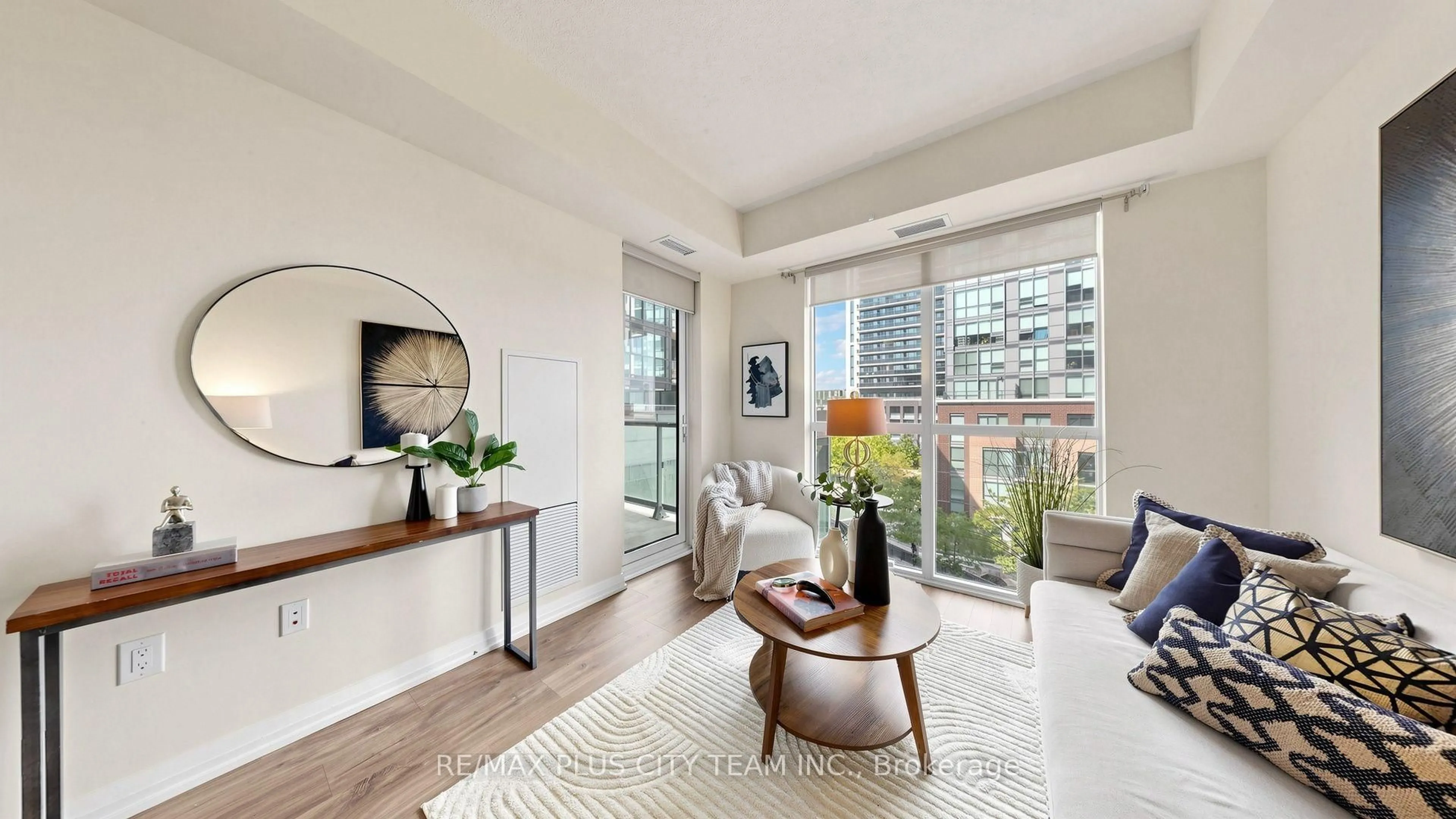 Living room with furniture, unknown for 50 Thomas Riley Rd #423, Toronto Ontario M9B 0C5