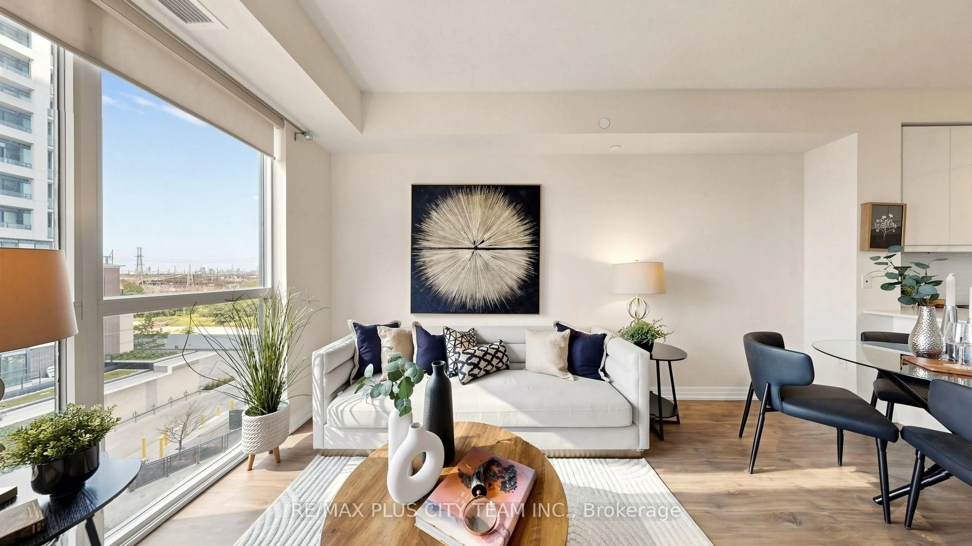 Living room with furniture, unknown for 50 Thomas Riley Rd #423, Toronto Ontario M9B 0C5