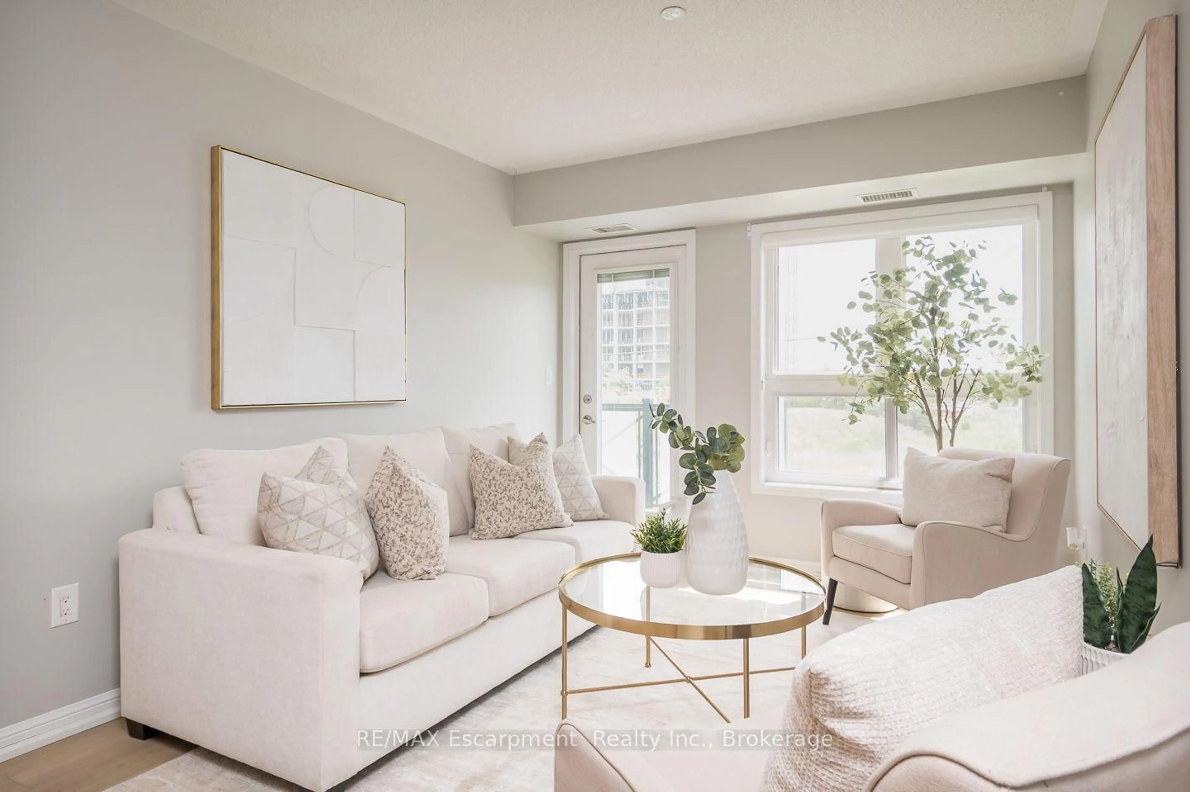 Living room with furniture, unknown for 1045 Nadalin Hts #307, Milton Ontario L9T 8R5