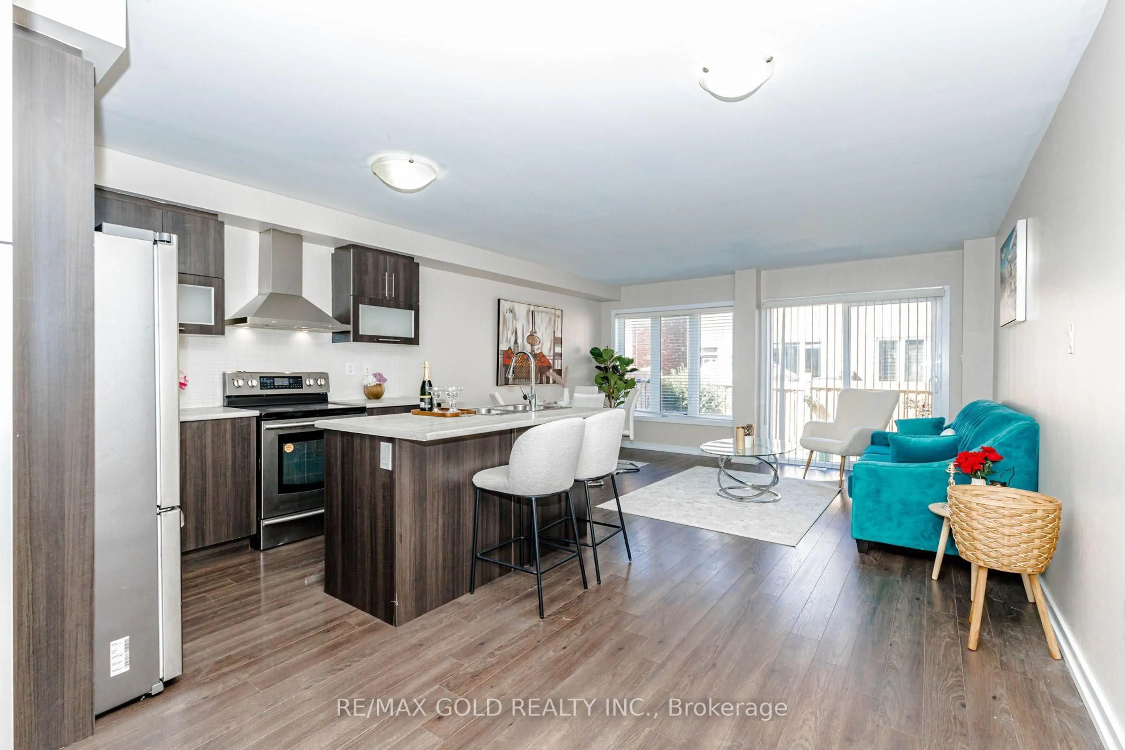 Open concept kitchen, wood/laminate floor for 22 clinton St, Brampton Ontario L7A 4K8