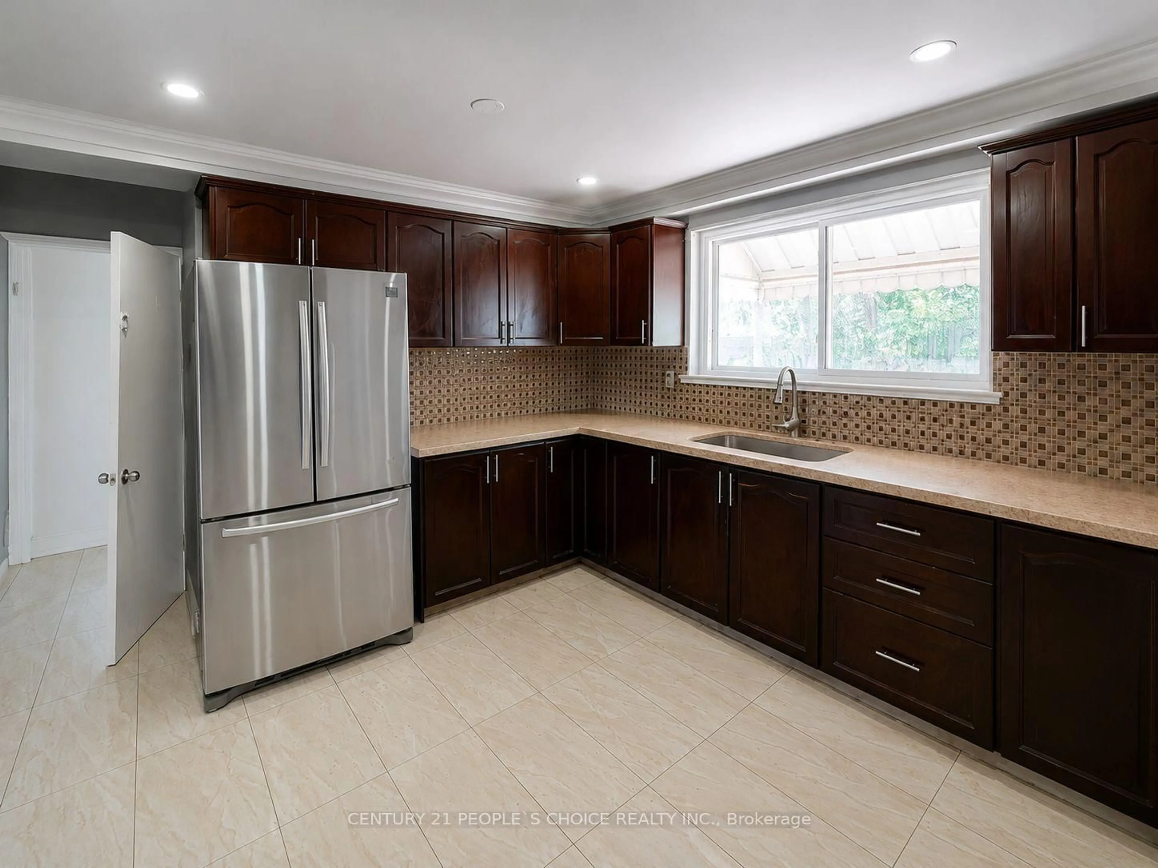 Open concept kitchen, ceramic/tile floor for 105 Lexington Ave, Toronto Ontario M9V 2G9