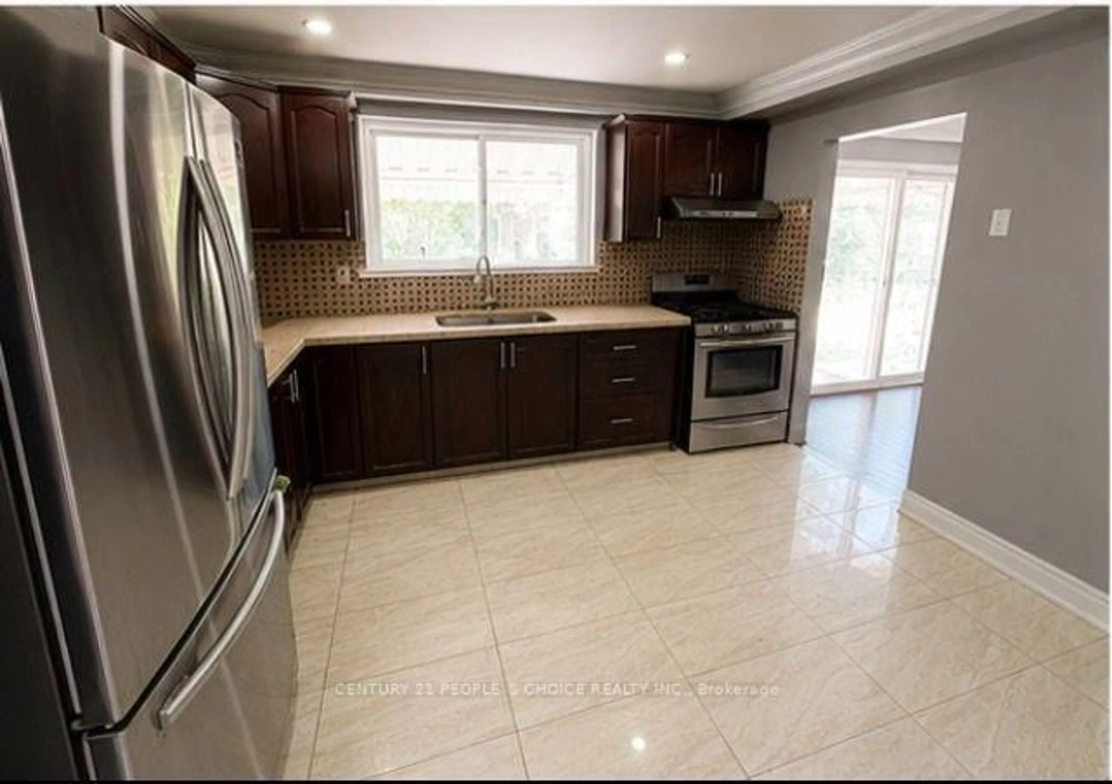 Open concept kitchen, ceramic/tile floor for 105 Lexington Ave, Toronto Ontario M9V 2G9