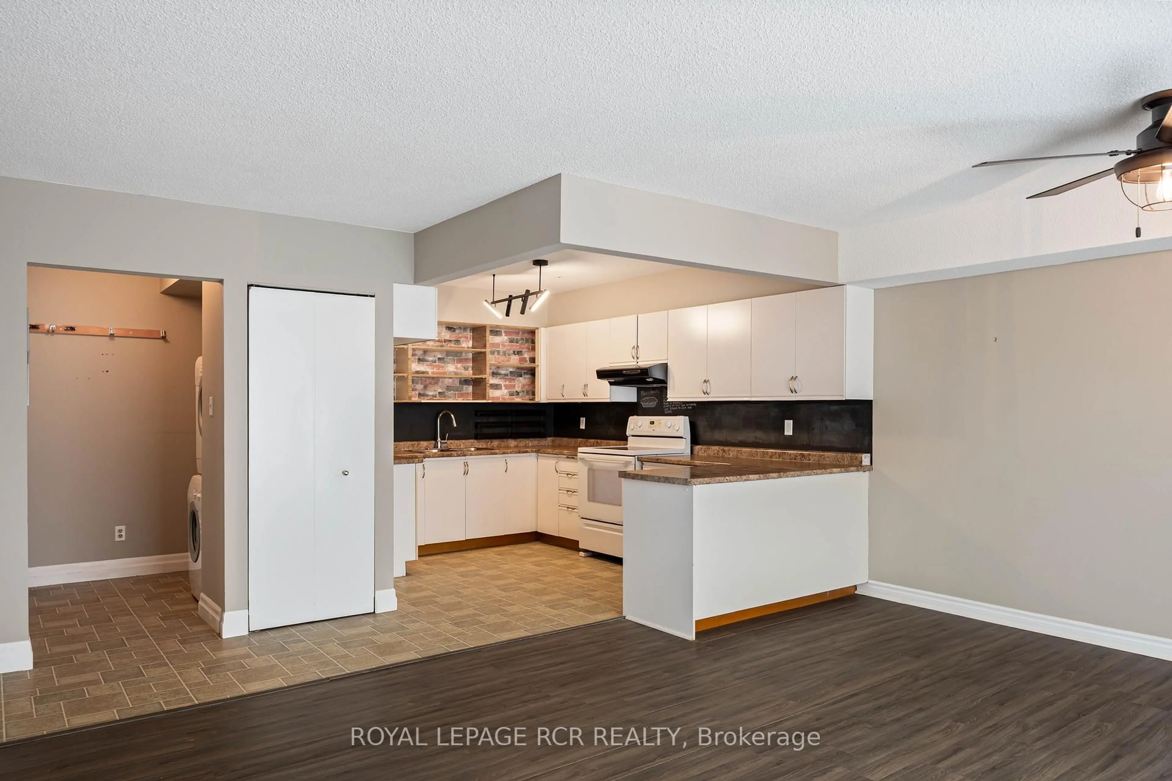 Open concept kitchen, wood/laminate floor for 16 Fourth St #32, Orangeville Ontario L9W 4N7