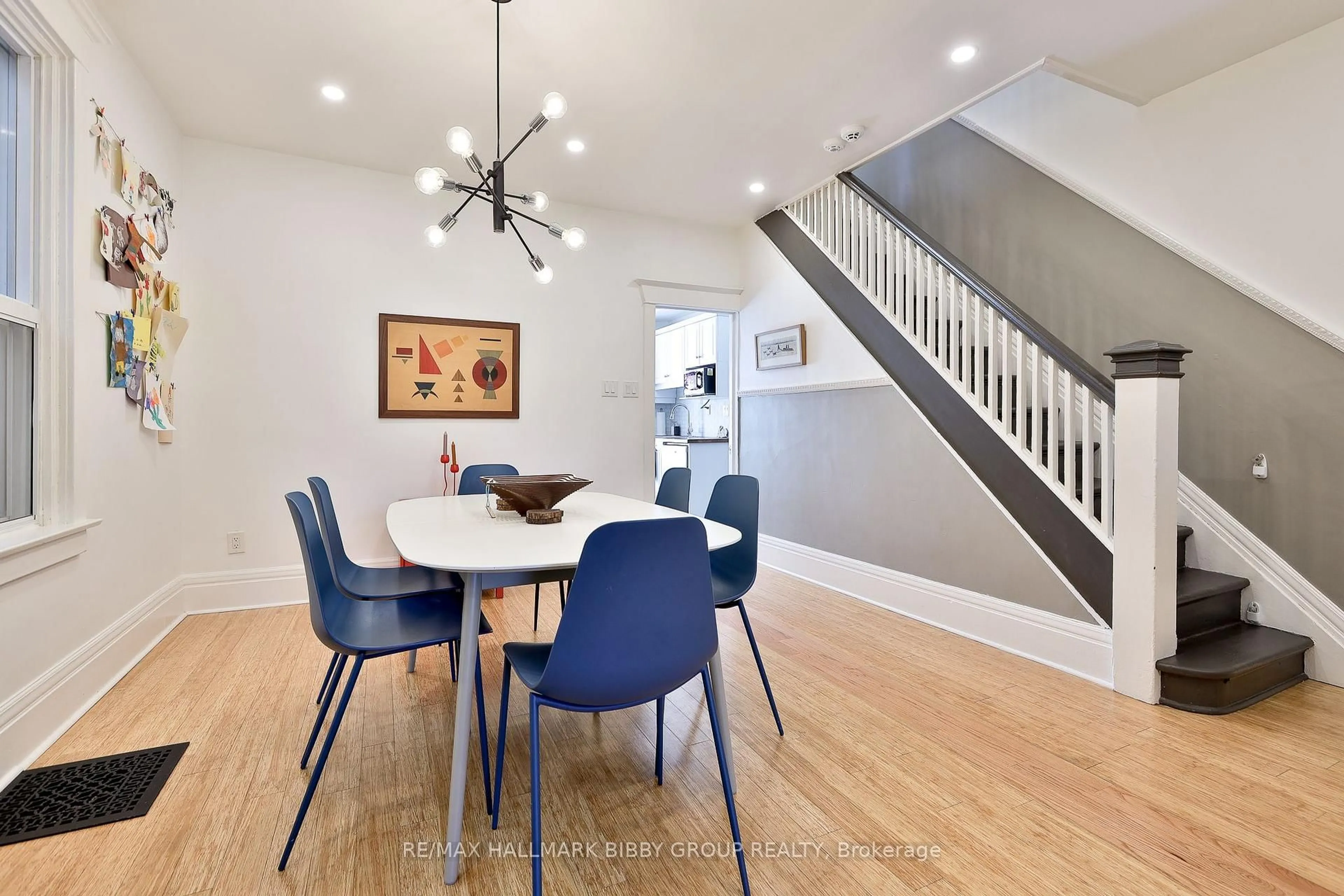 Dining room, wood/laminate floor for 987 Saint Clarens Ave, Toronto Ontario M6H 3X8