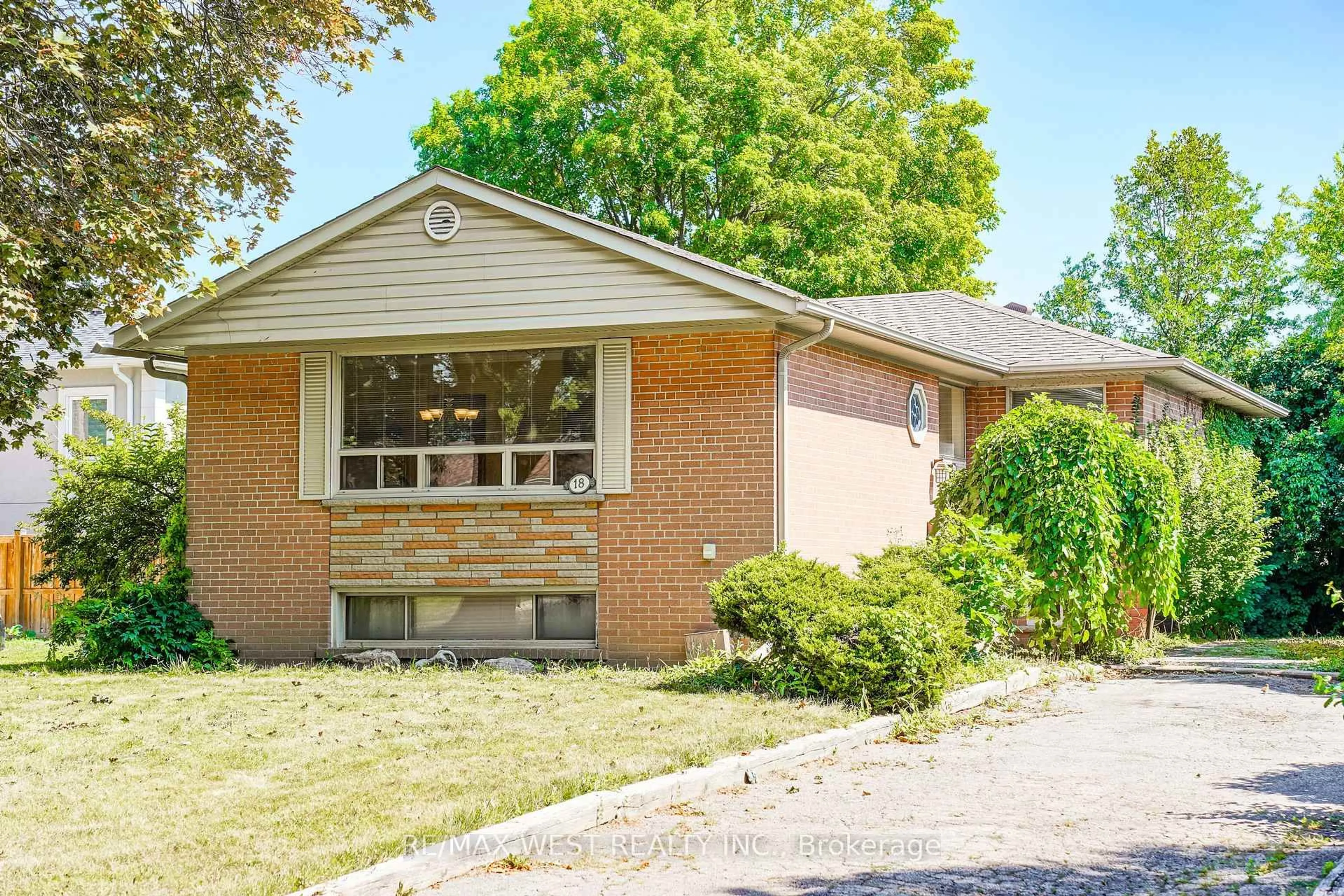 Home with brick exterior material, street for 18 Mcclure Ave, Brampton Ontario L6X 2E3
