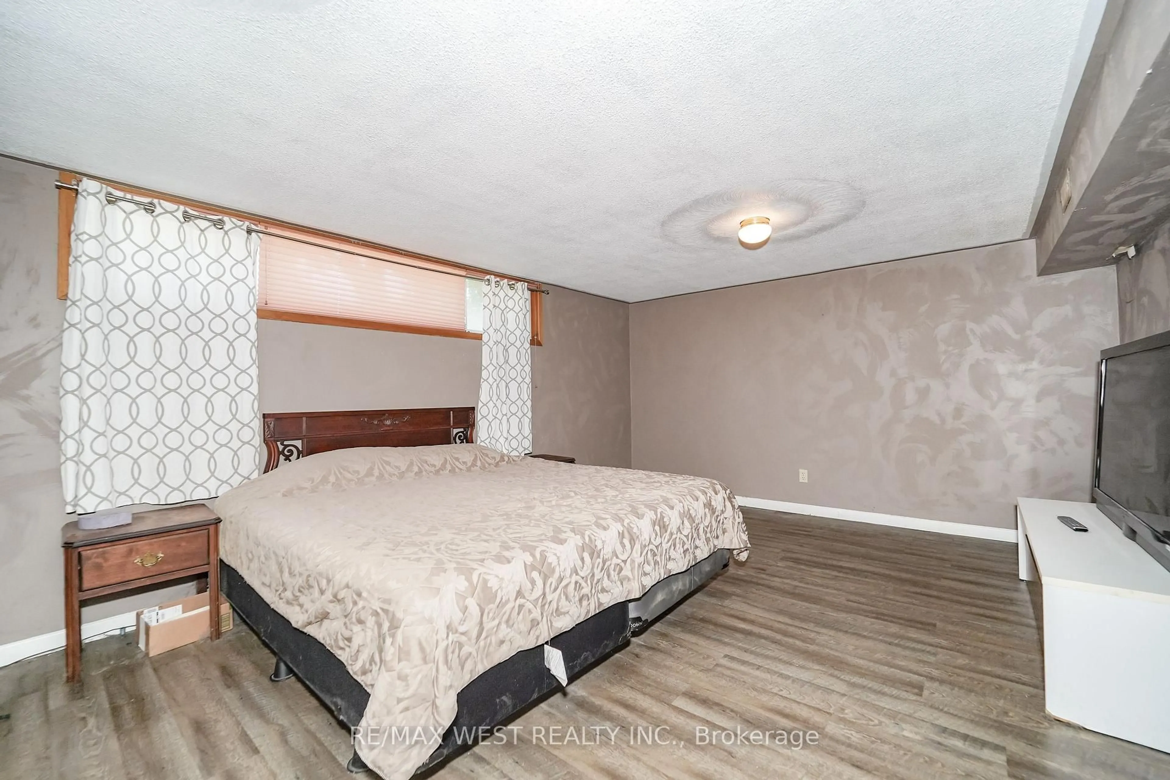 Bedroom with bed, unknown for 18 Mcclure Ave, Brampton Ontario L6X 2E3