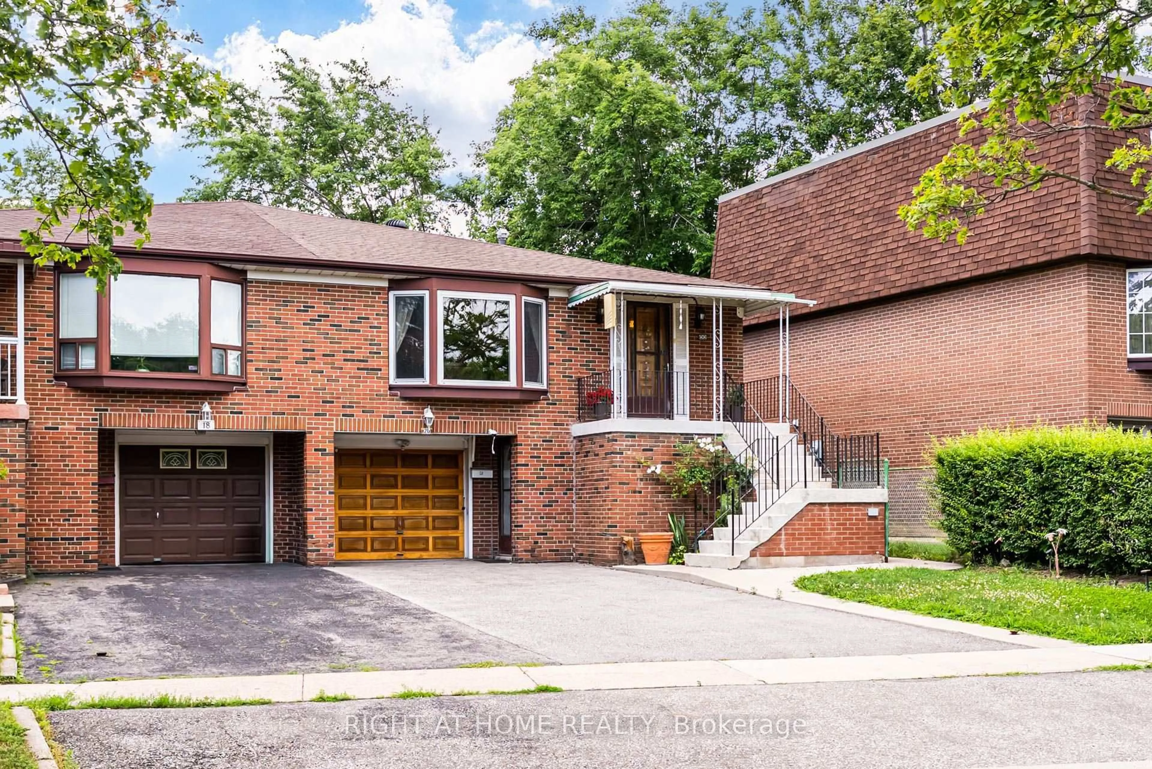 Home with brick exterior material, street for 20 Zealand Rd, Toronto Ontario M9R 3W4