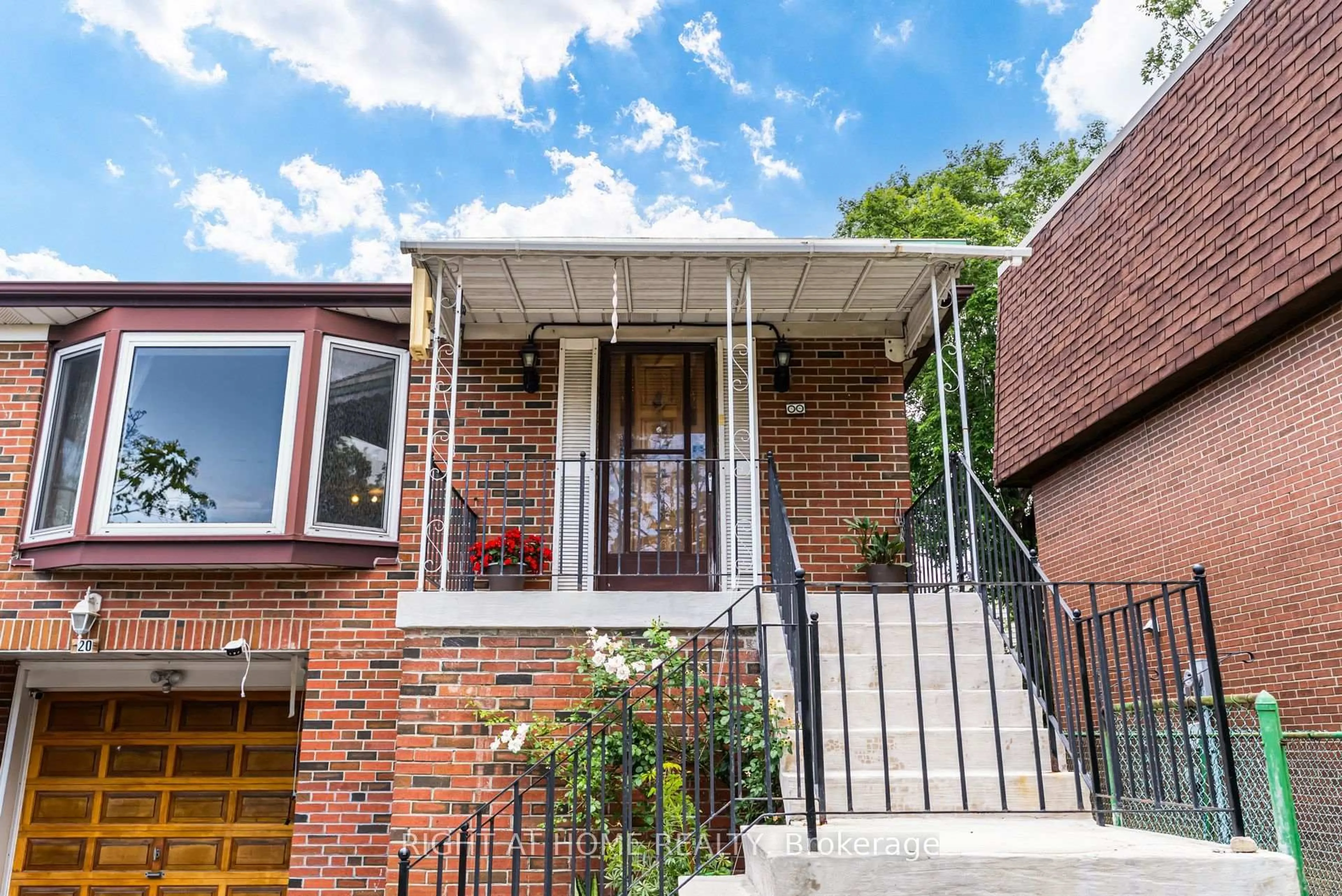 Home with brick exterior material, street for 20 Zealand Rd, Toronto Ontario M9R 3W4