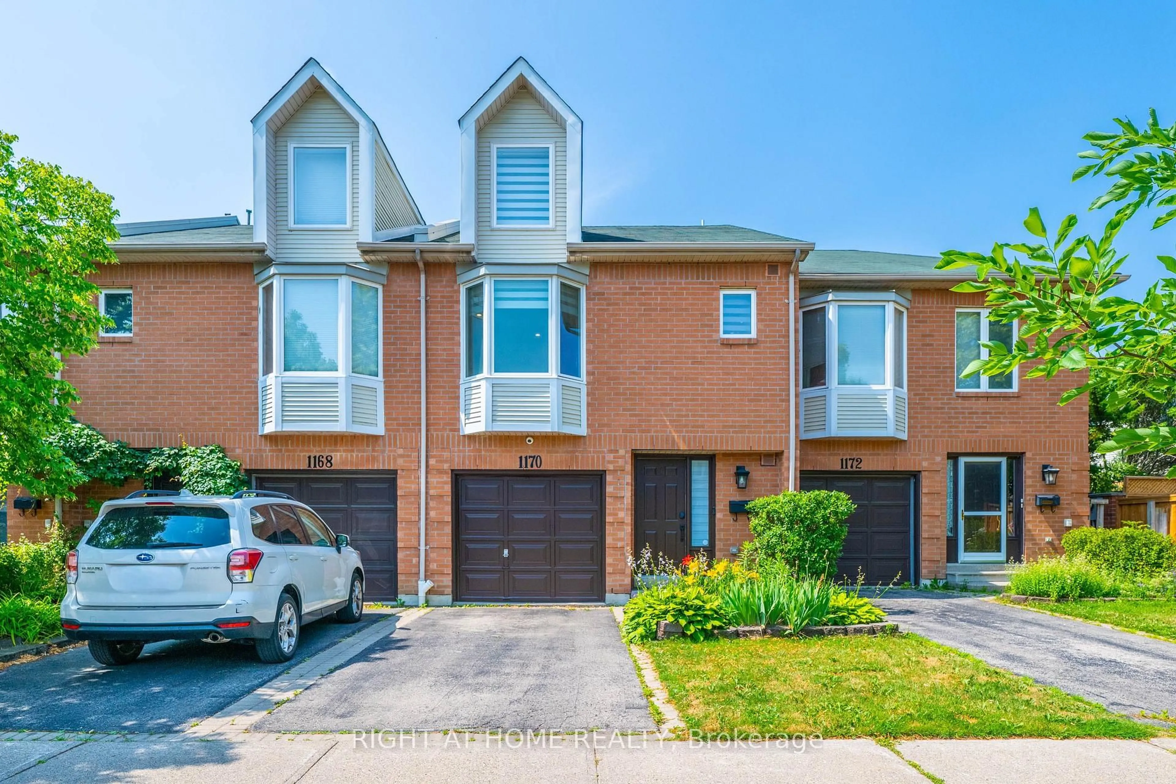 Home with brick exterior material, street for 1170 West Shore Dr #23, Mississauga Ontario L5E 3H8