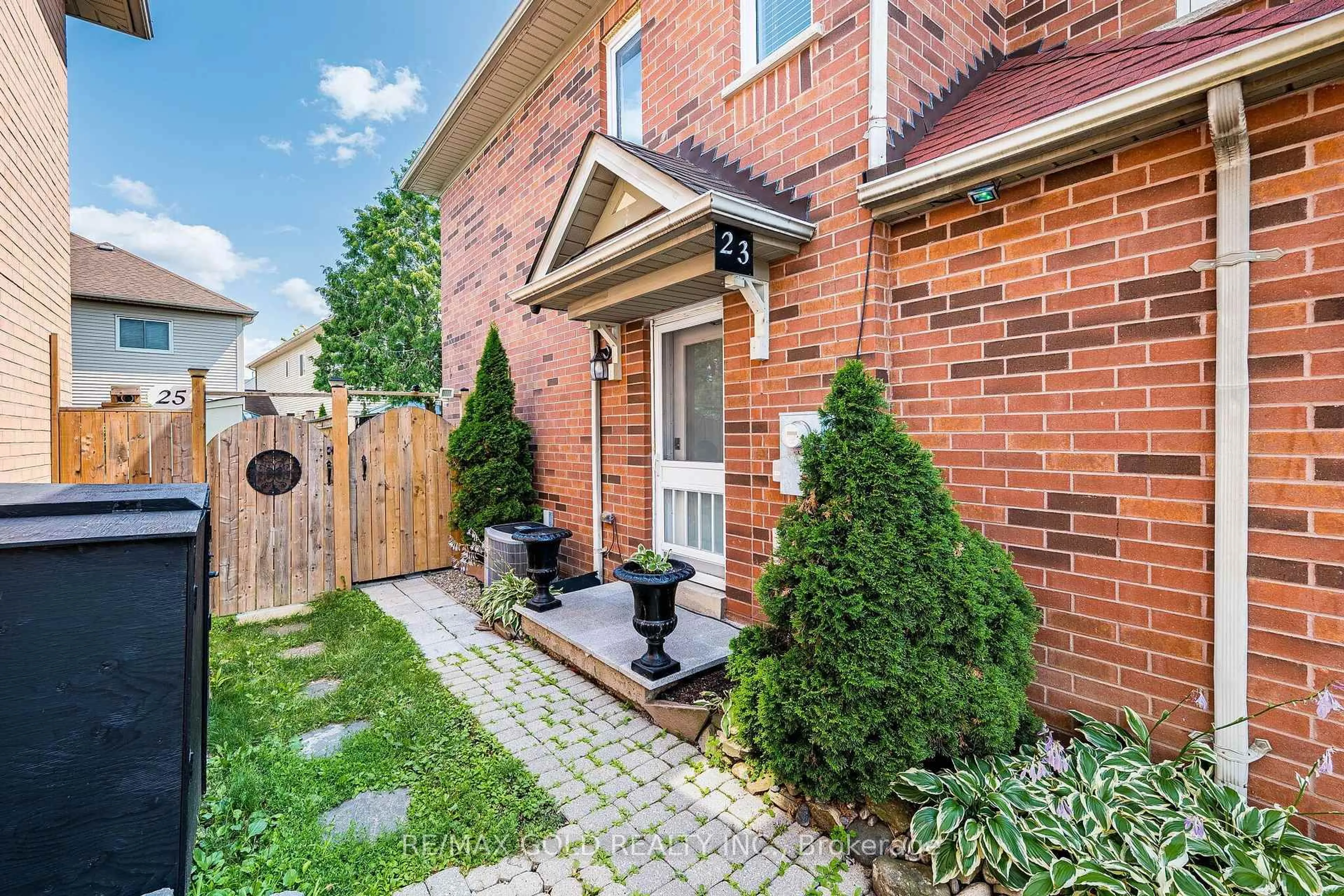 Home with brick exterior material, street for 23 Rain Lily Lane, Brampton Ontario L6R 1S4