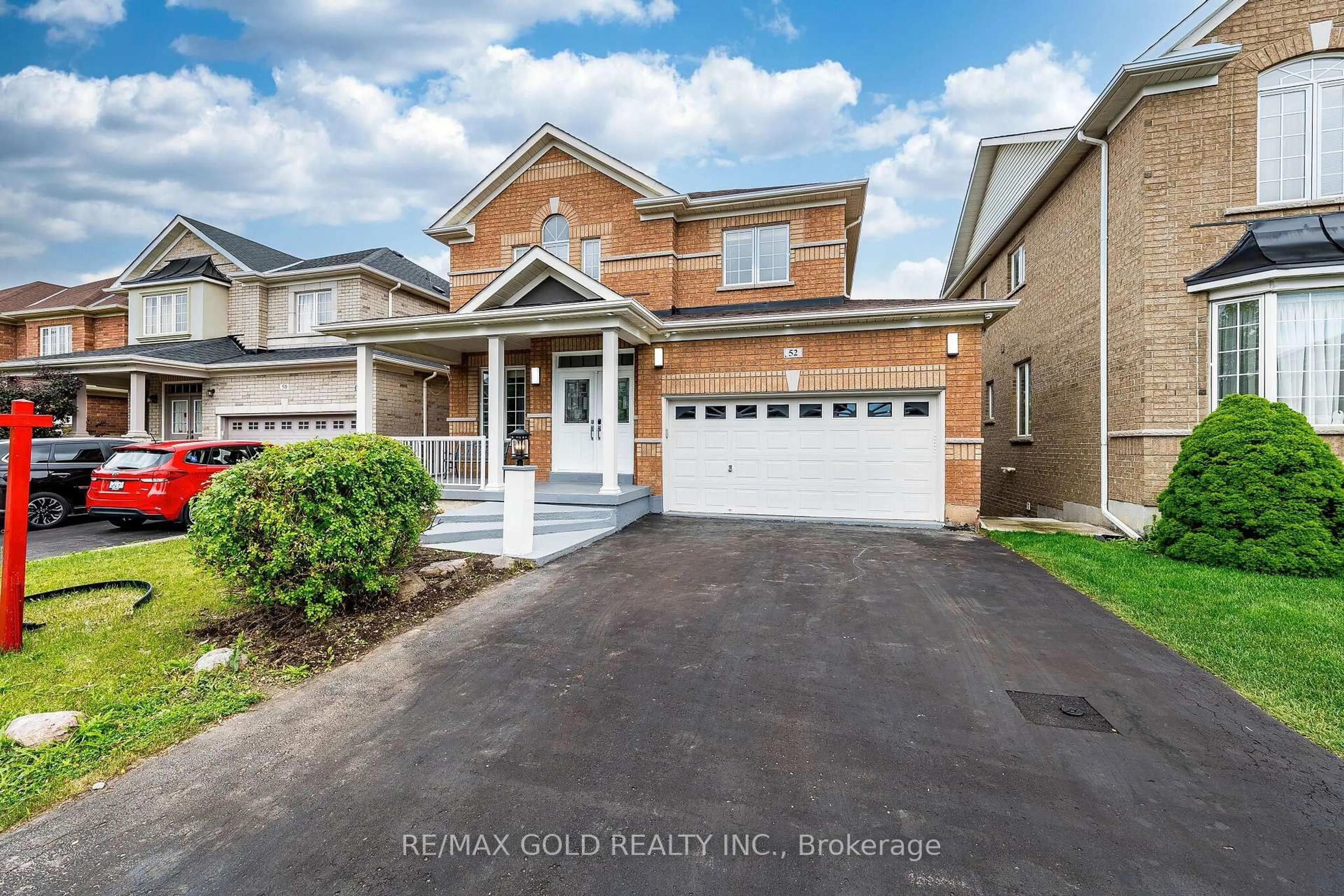 Home with brick exterior material, street for 52 Moldovan Dr, Brampton Ontario L6R 0E4