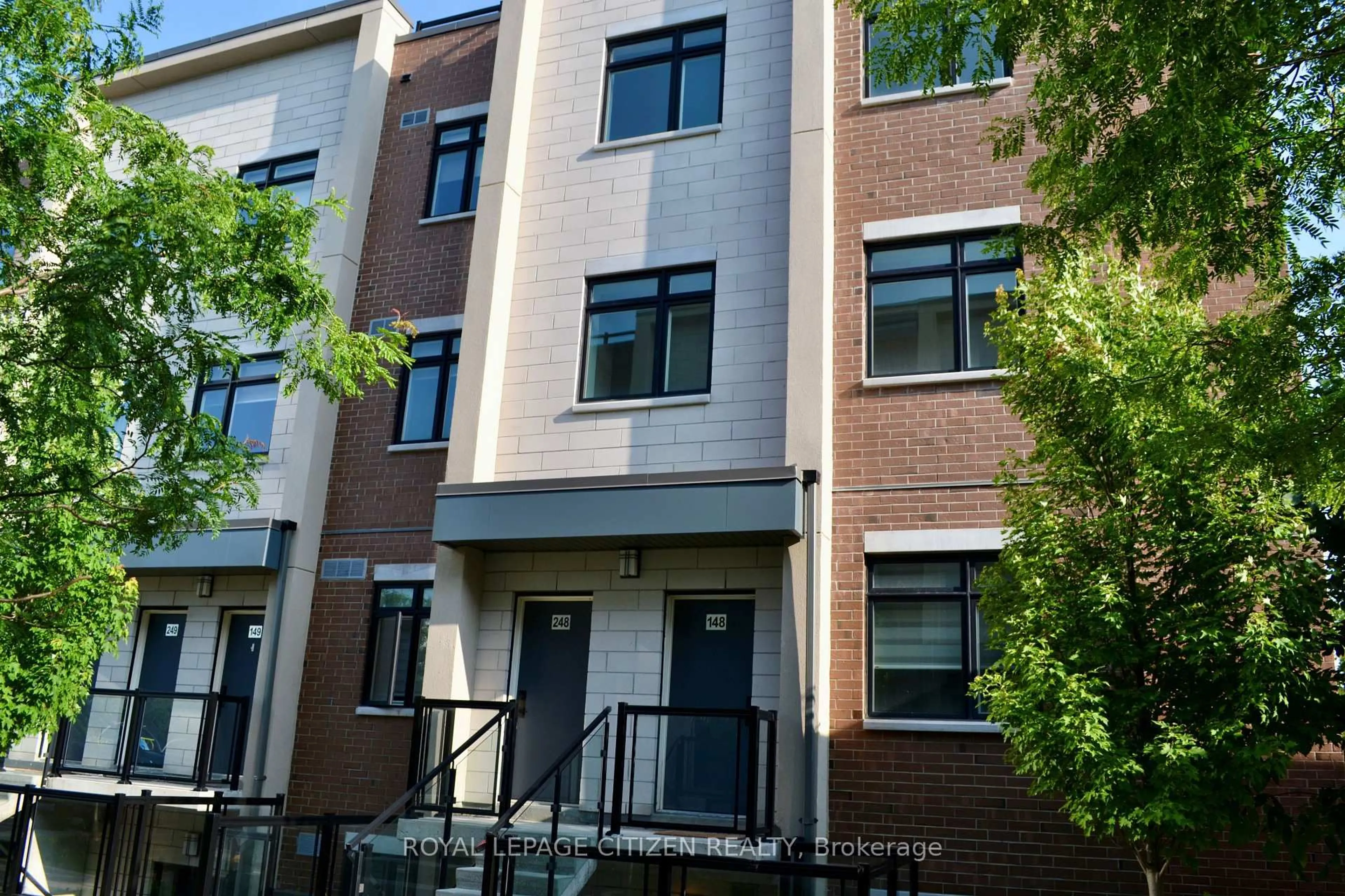Home with brick exterior material, street for 1075 Douglas Mccurdy Common #248, Mississauga Ontario L5G 0C6