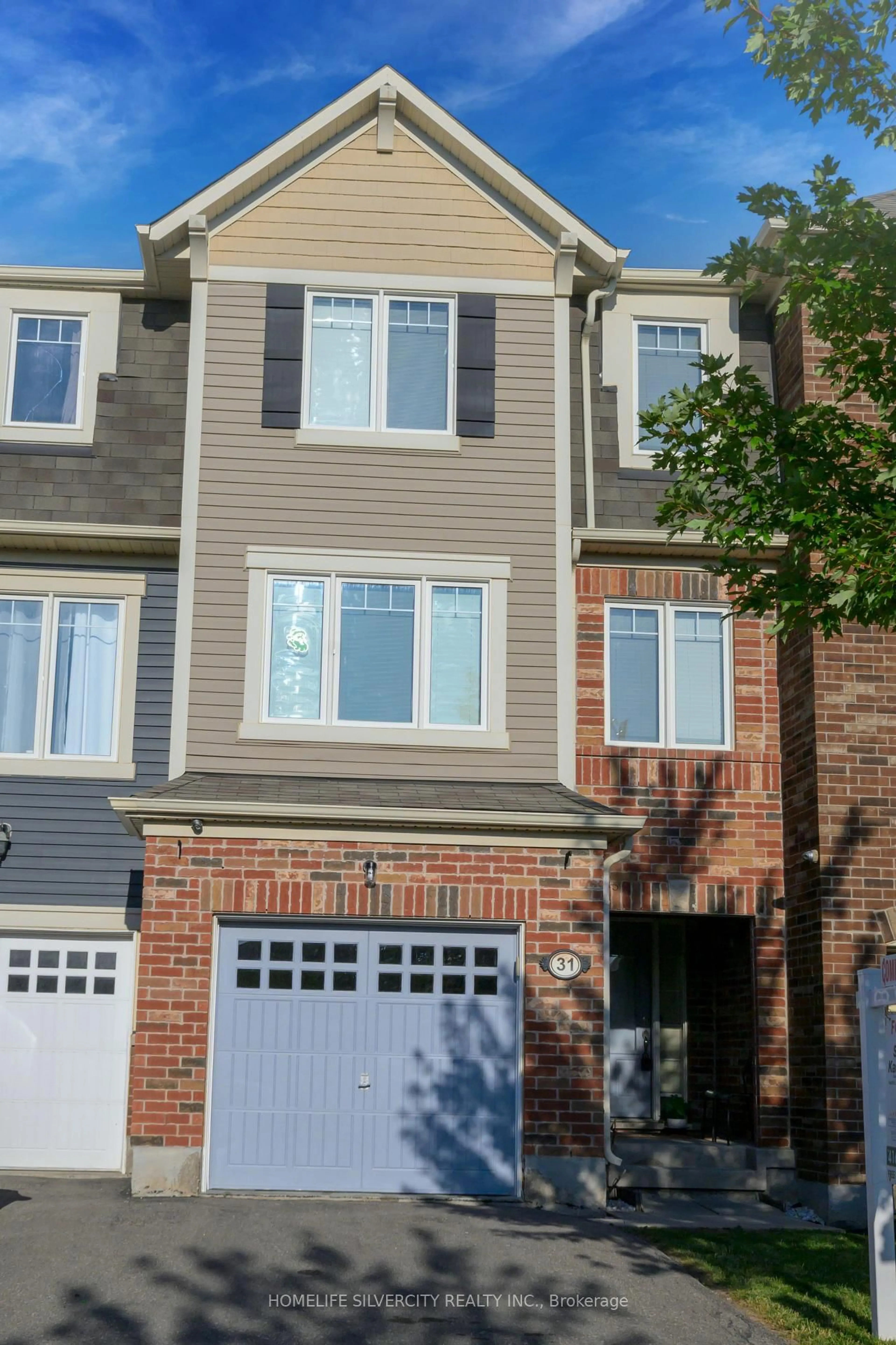 Home with brick exterior material, street for 31 Betterton Cres, Brampton Ontario L7A 0S5