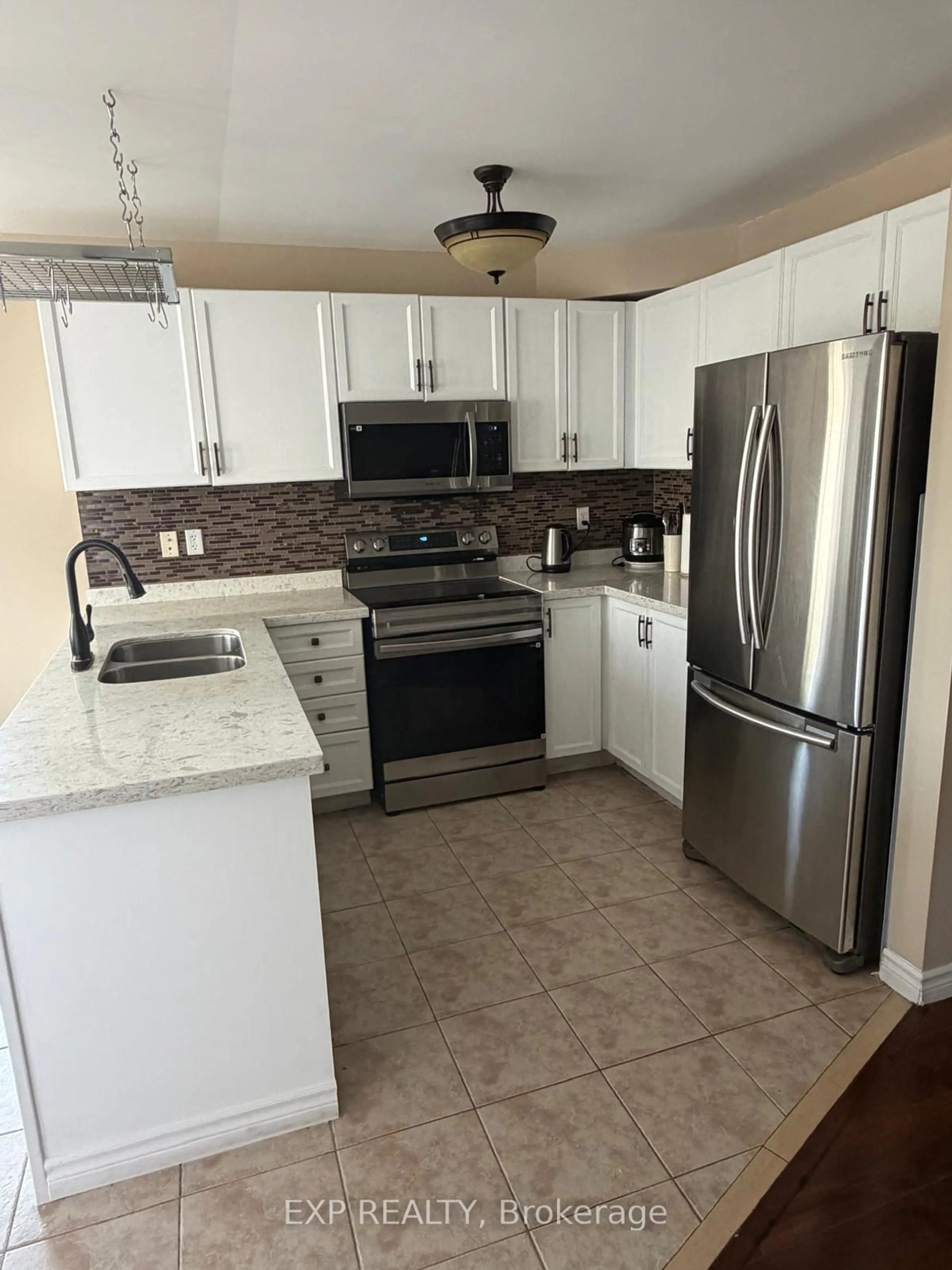Standard kitchen, ceramic/tile floor for 5110 Fairview St #32, Burlington Ontario L7L 7H6