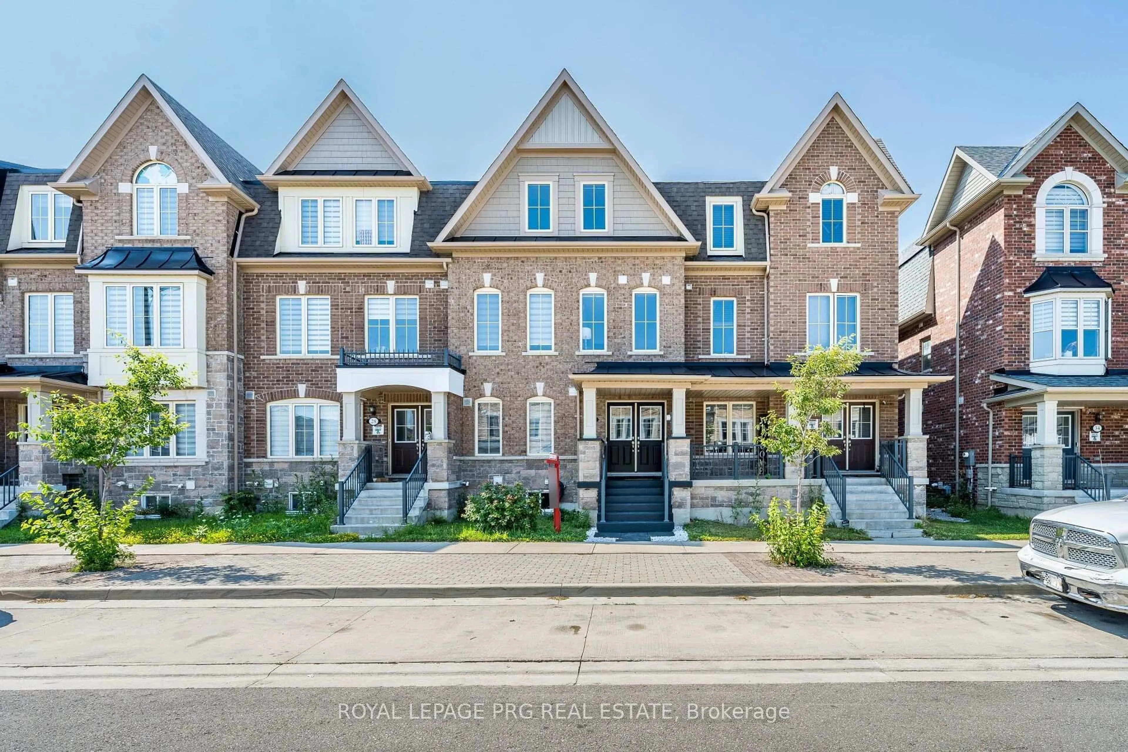 Home with brick exterior material, street for 30 Remembrance Rd, Brampton Ontario L7A 4Y8