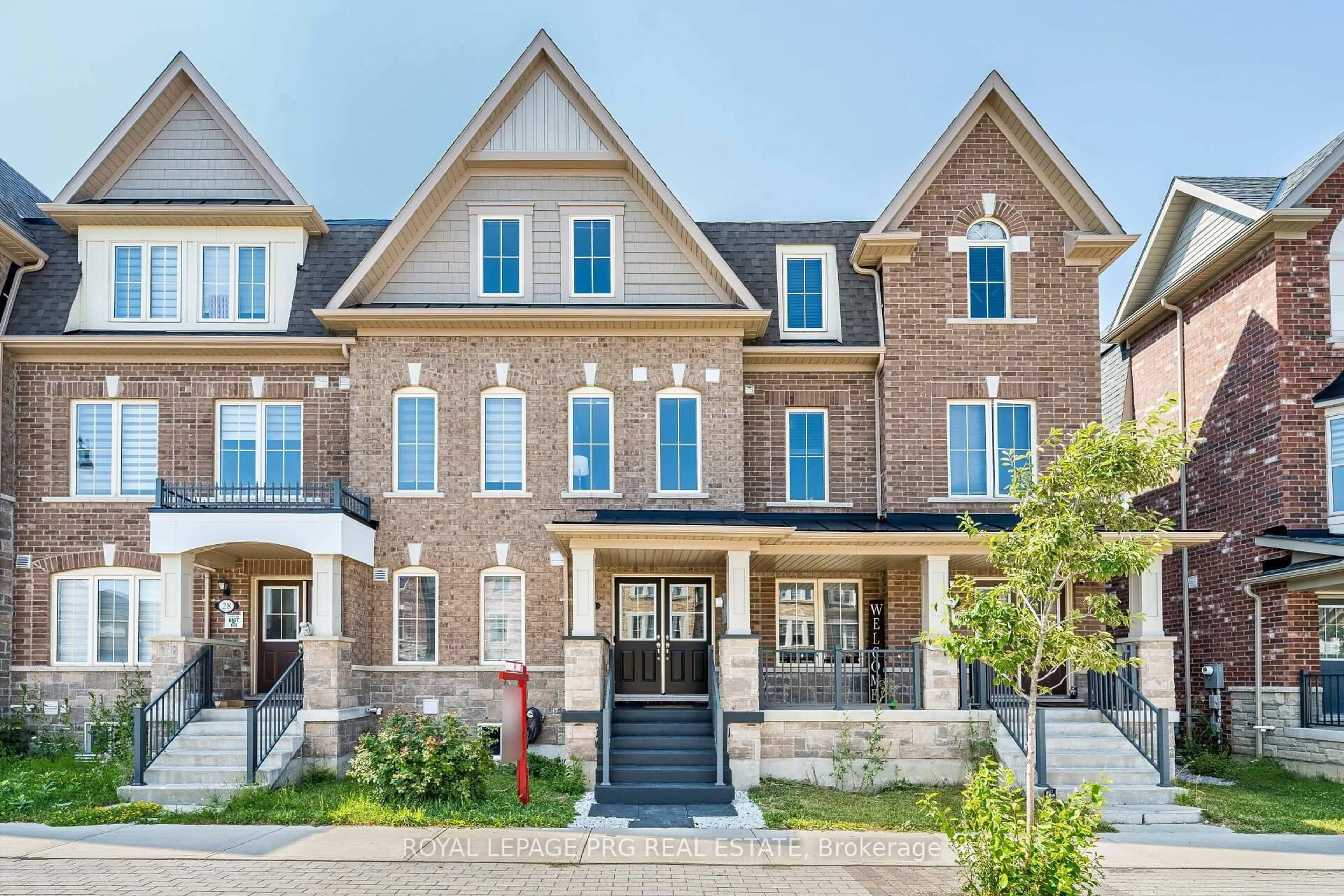 Home with brick exterior material, street for 30 Remembrance Rd, Brampton Ontario L7A 4Y8