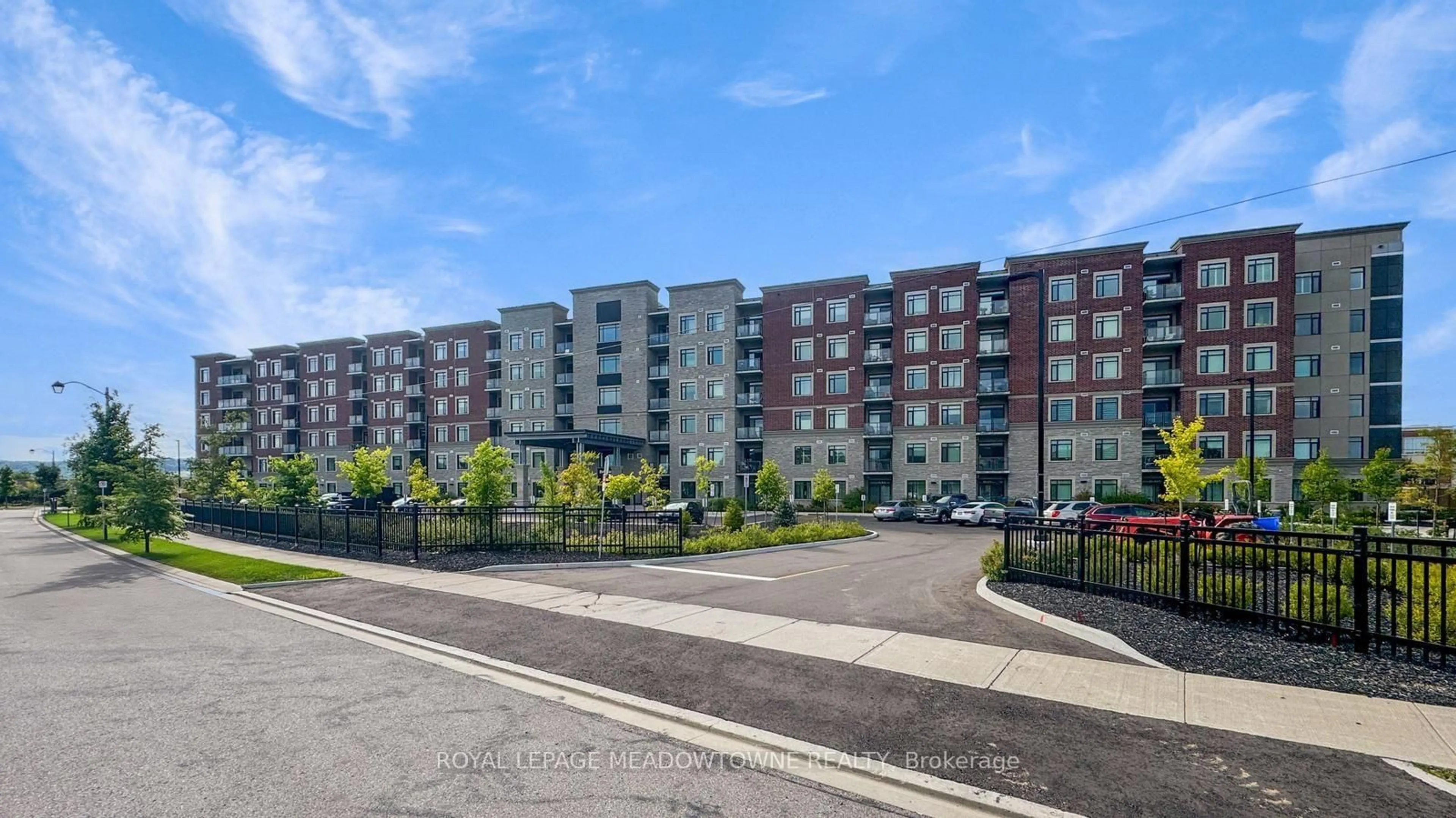 A pic from outside/outdoor area/front of a property/back of a property/a pic from drone, street for 830 Megson Terr #213, Milton Ontario L9T 7H3