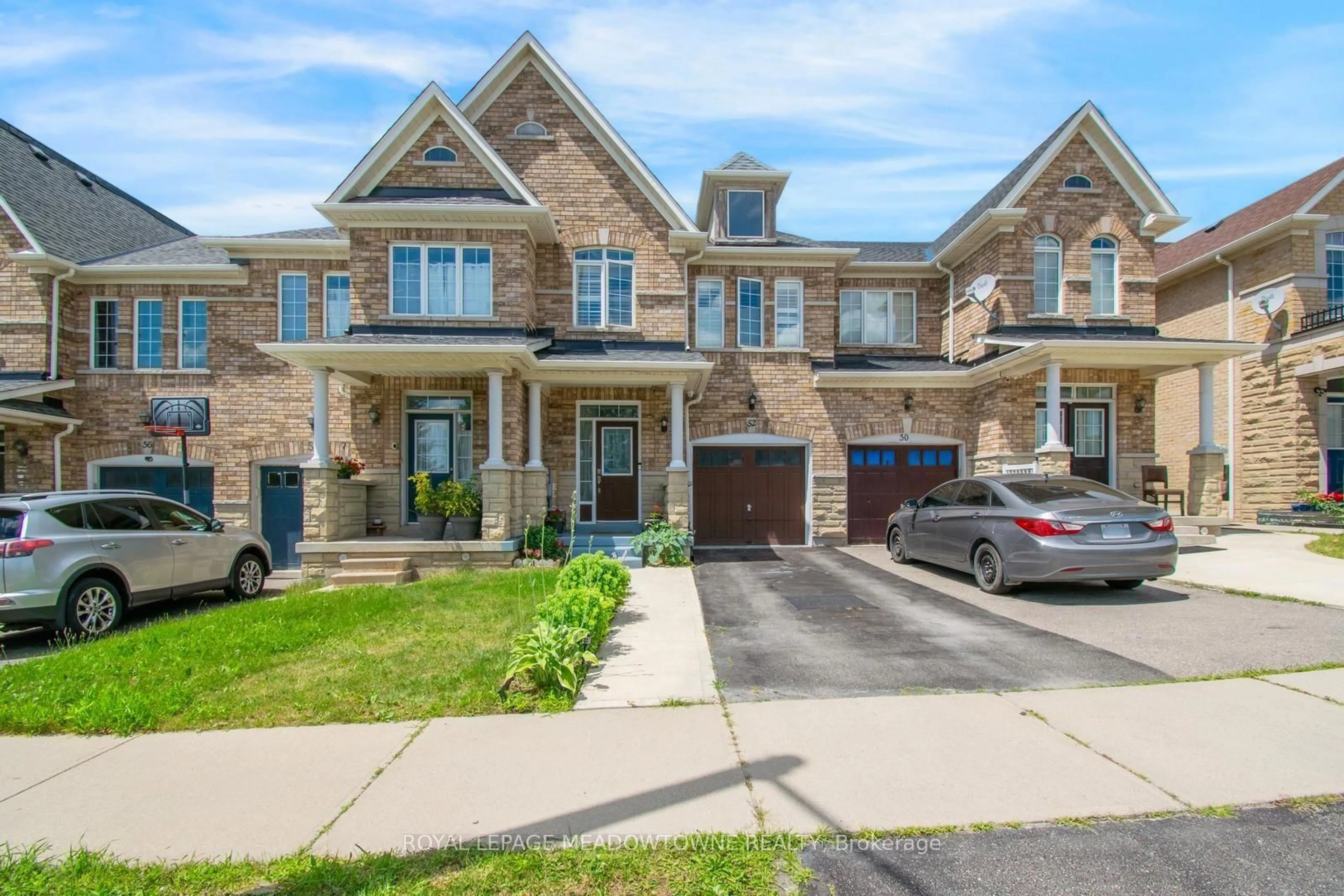 Home with brick exterior material, street for 52 Royal Vista Rd, Brampton Ontario L6Y 0N5