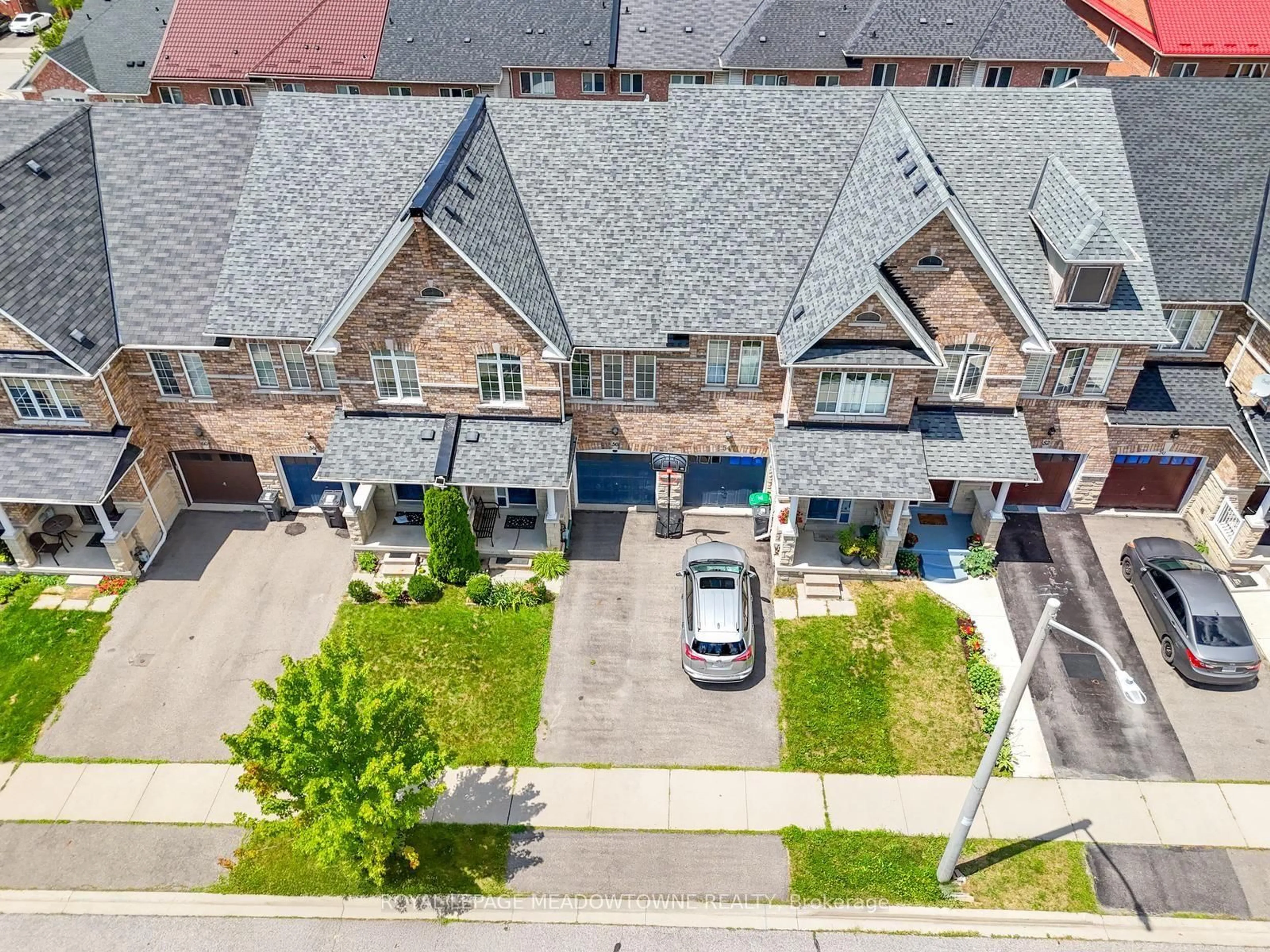 A pic from outside/outdoor area/front of a property/back of a property/a pic from drone, street for 52 Royal Vista Rd, Brampton Ontario L6Y 0N5