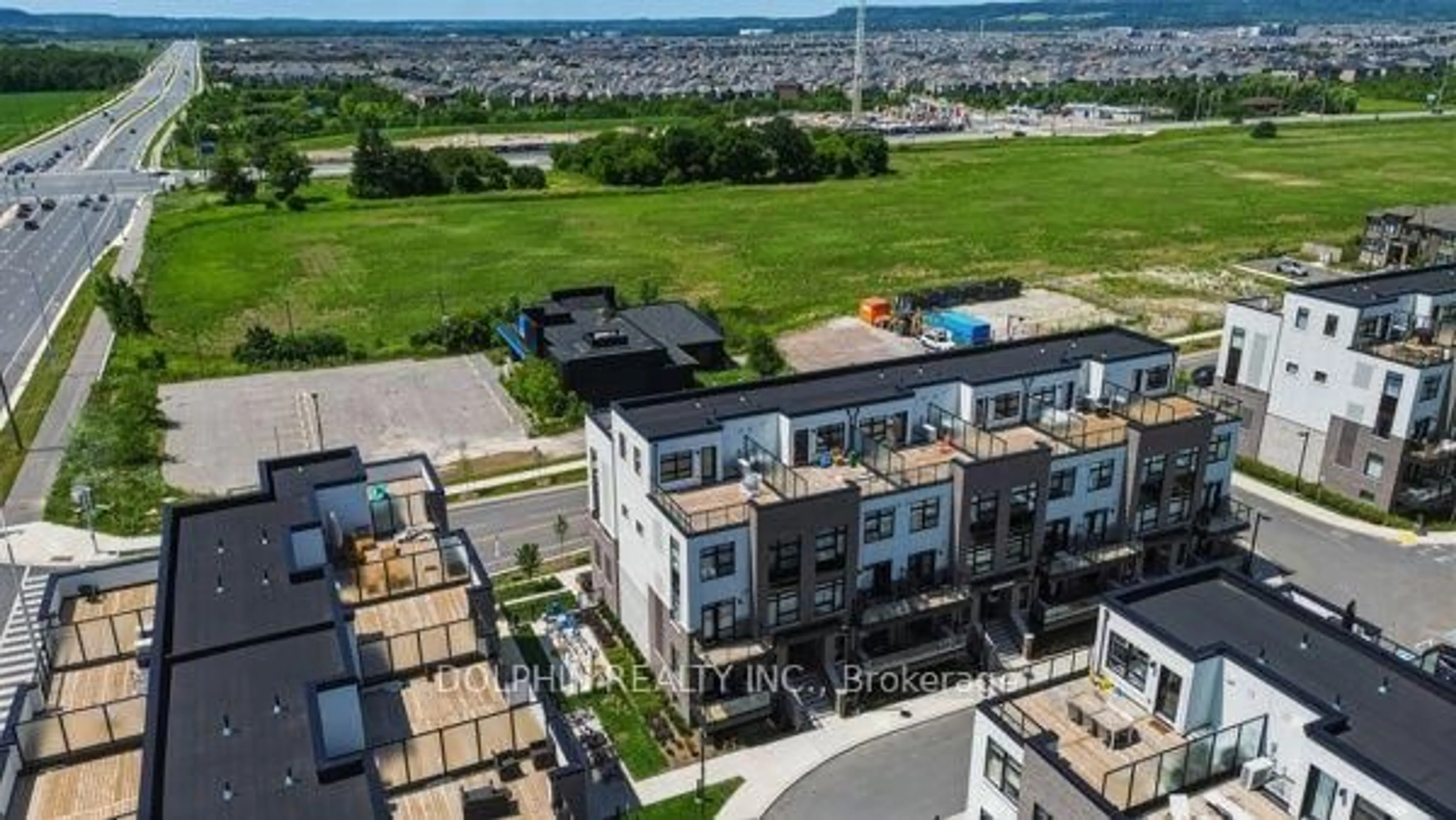 A pic from outside/outdoor area/front of a property/back of a property/a pic from drone, city buildings view from balcony for 1589 Rose Way #106, Milton Ontario L9E 1N4