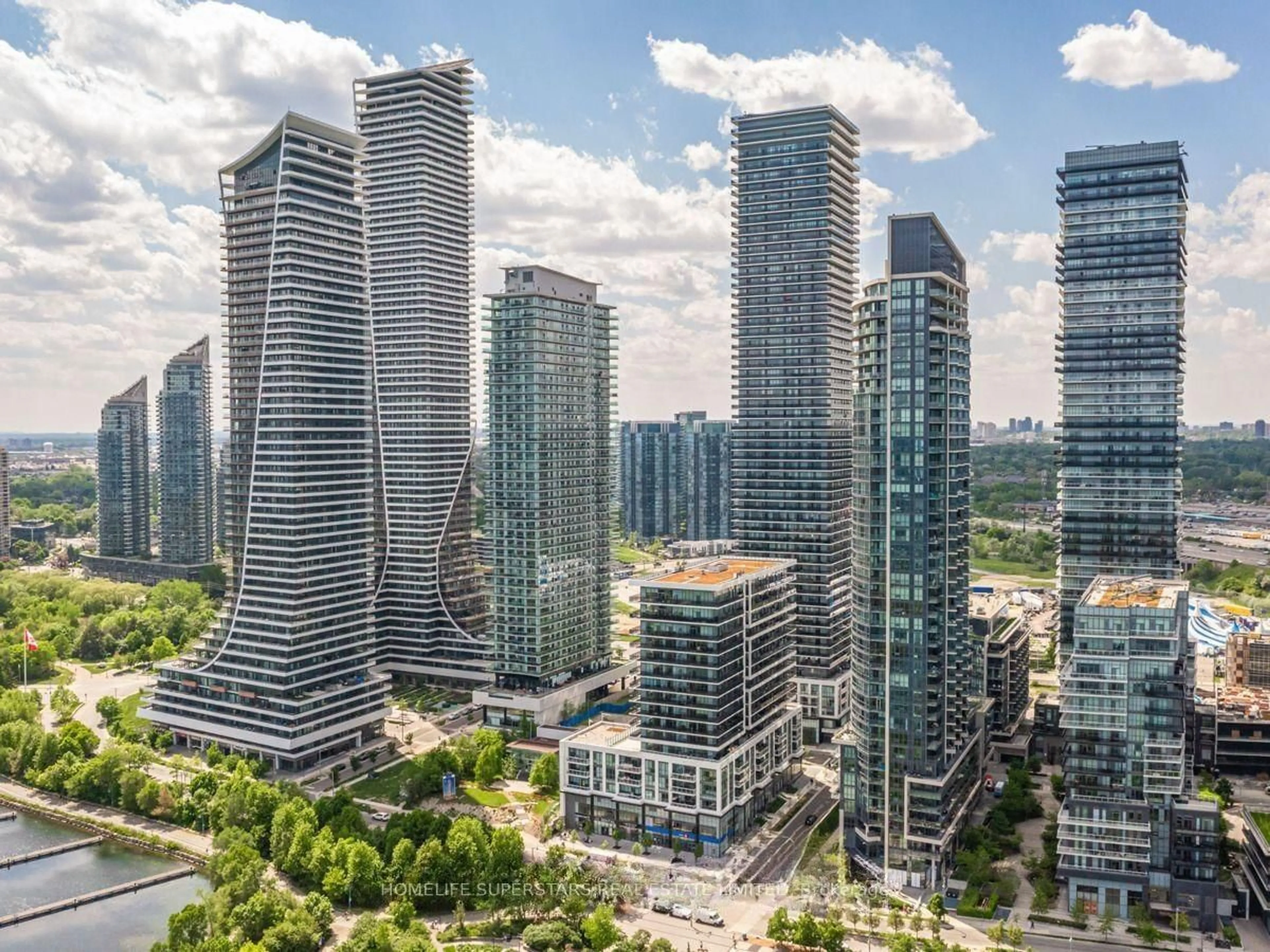 A pic from outside/outdoor area/front of a property/back of a property/a pic from drone, city buildings view from balcony for 65 Annie Craig Dr #407, Toronto Ontario M8V 0G3
