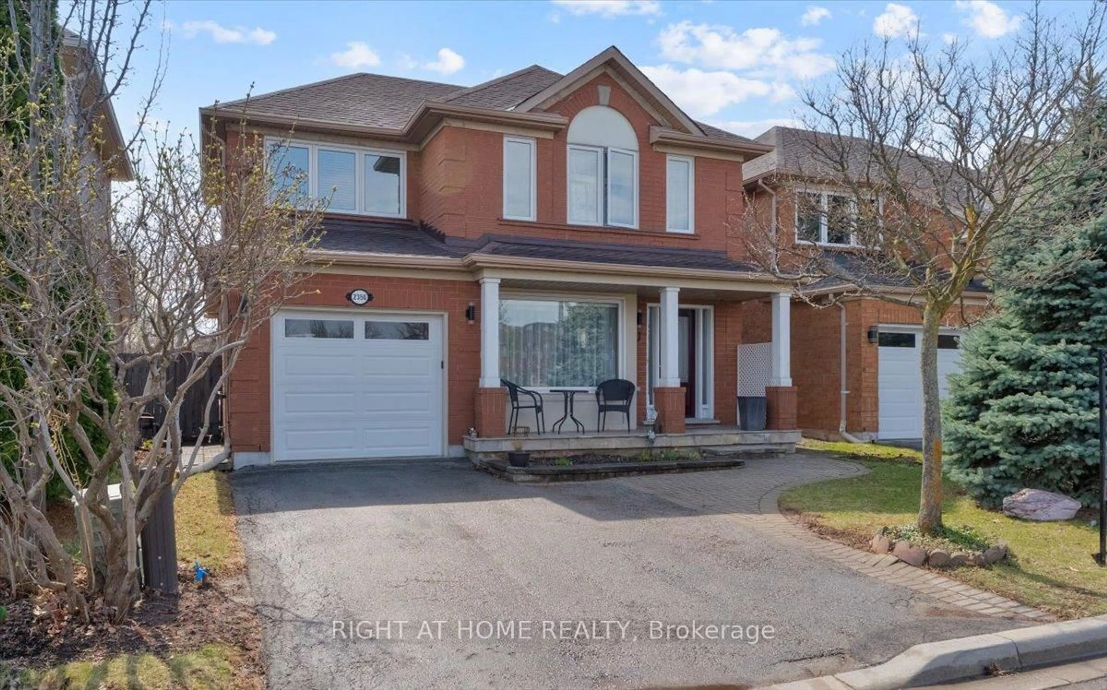 Home with brick exterior material, street for 2356 Proudfoot Tr, Oakville Ontario L6M 3Y2