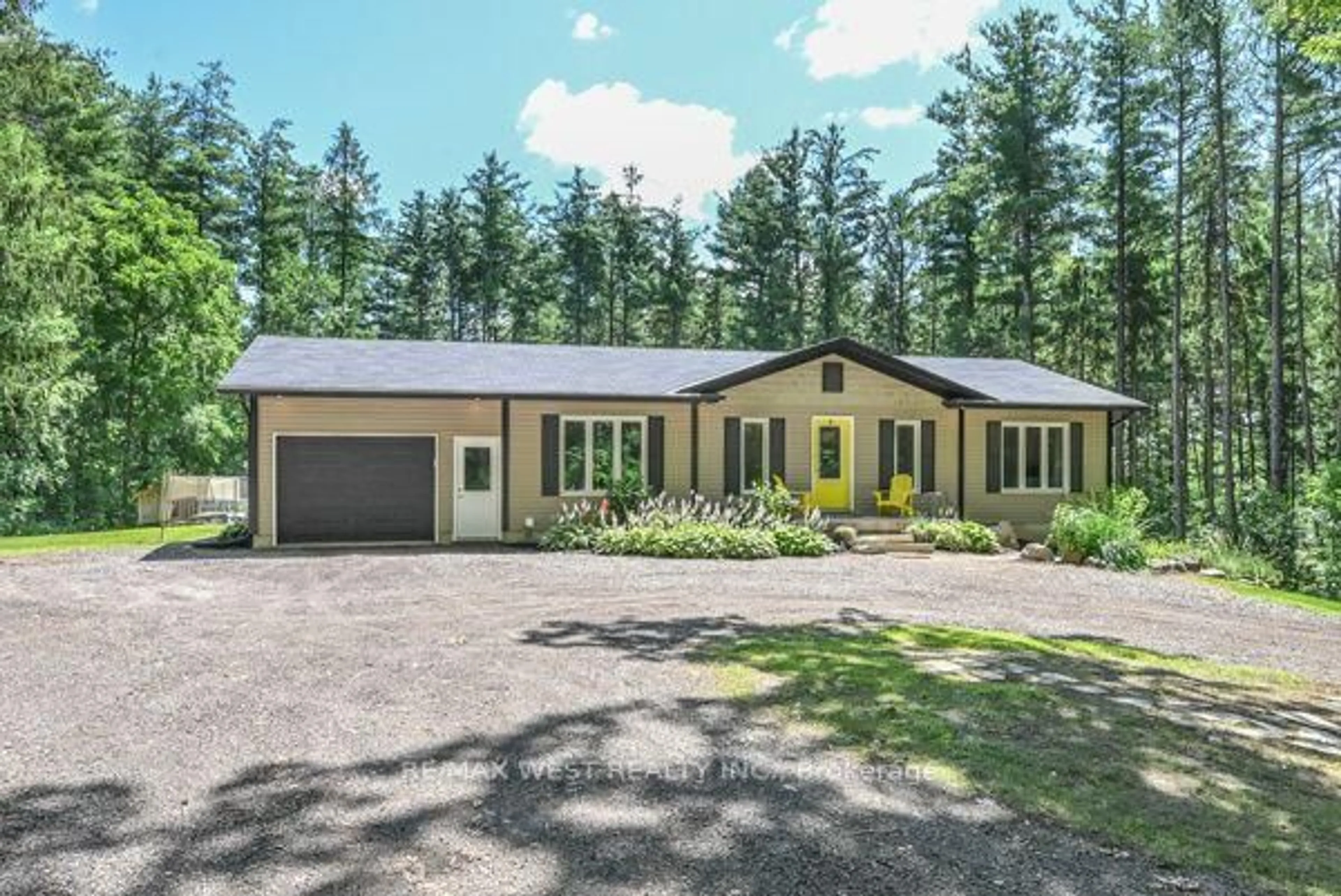 Home with vinyl exterior material, street for 5651 The Grange Side Rd, Caledon Ontario L7C 0G5