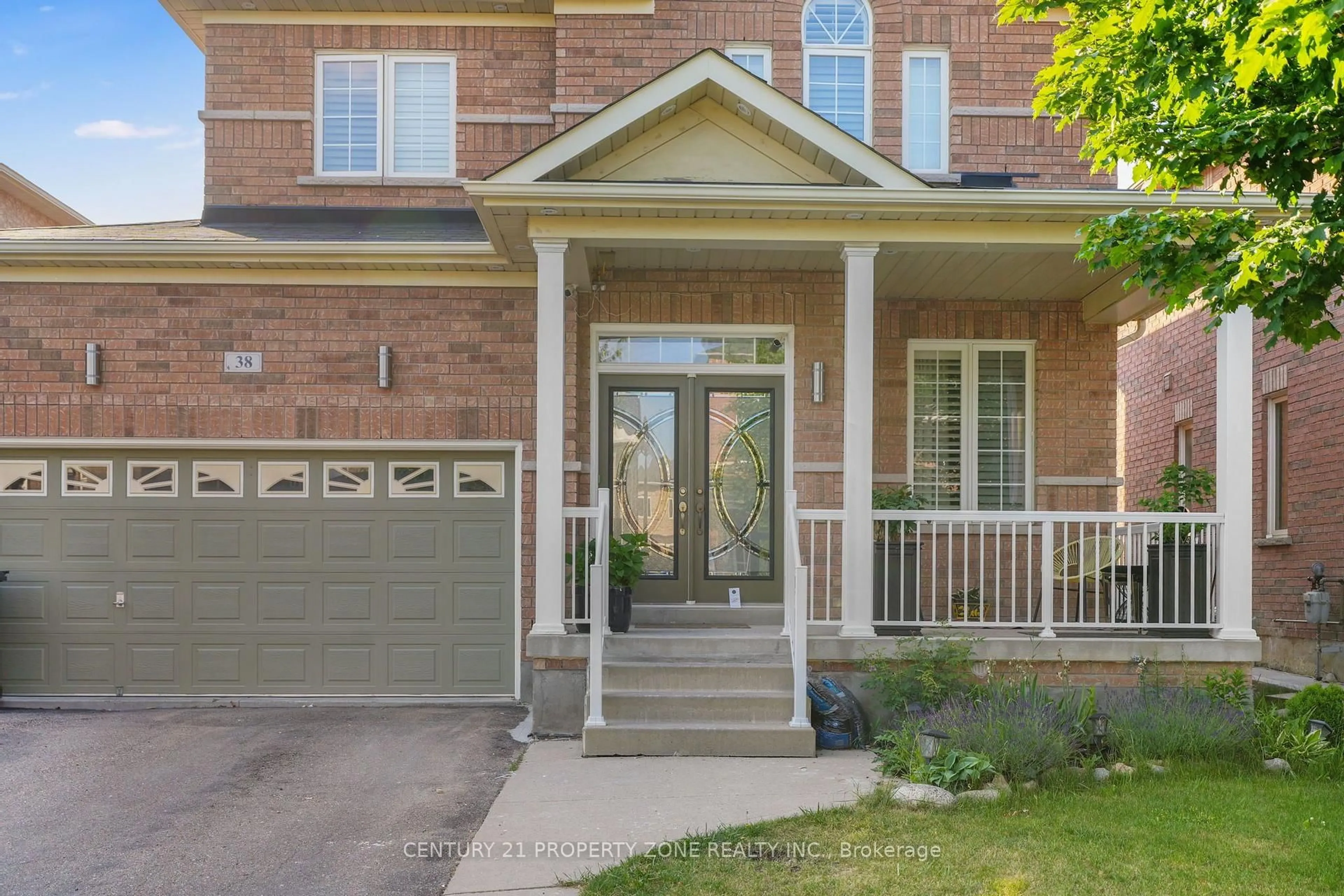 Home with brick exterior material, street for 38 Callalily Rd, Brampton Ontario L7A 0M2