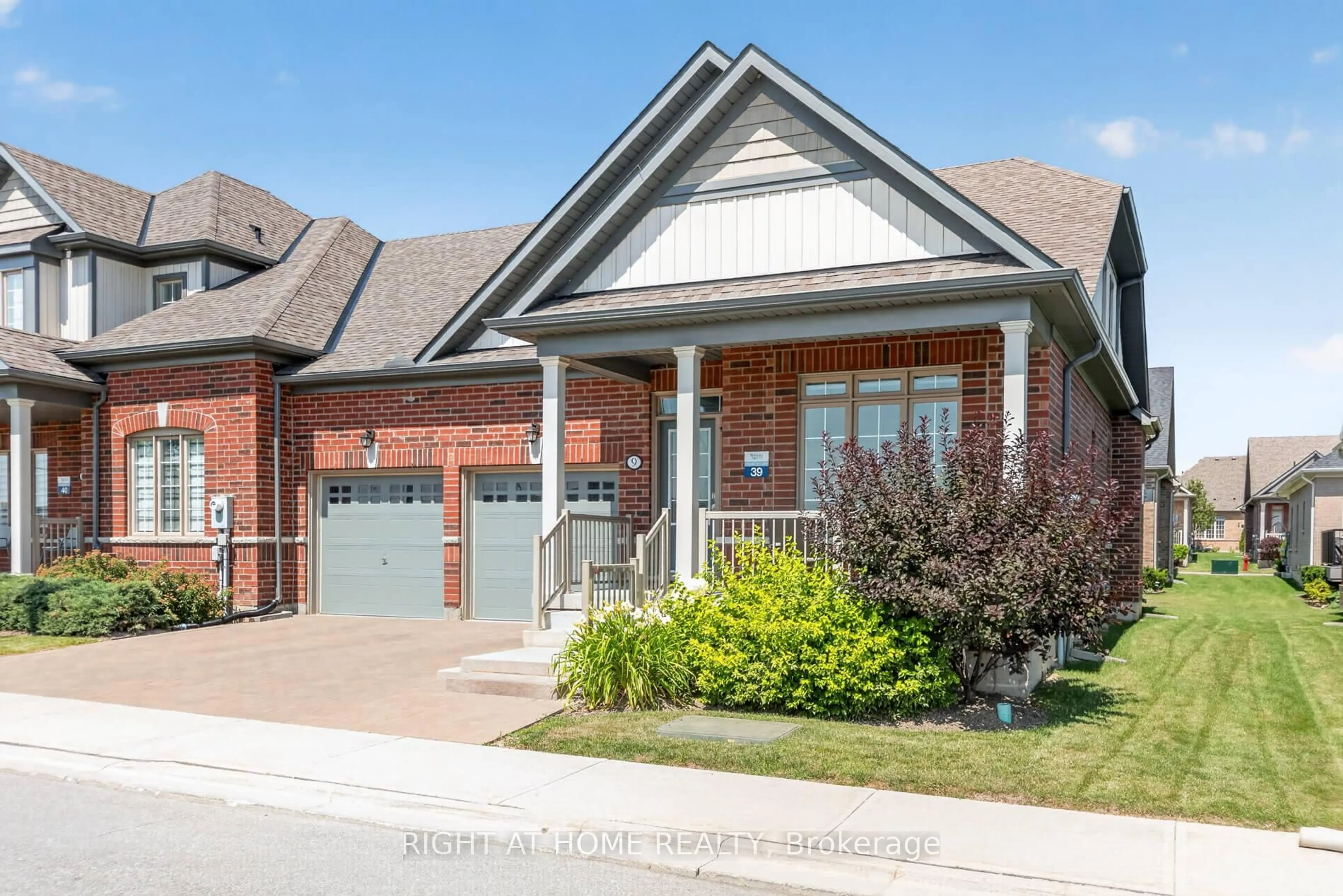 Home with brick exterior material, street for 9 Tea Rose Dr, Brampton Ontario L6R 4B6