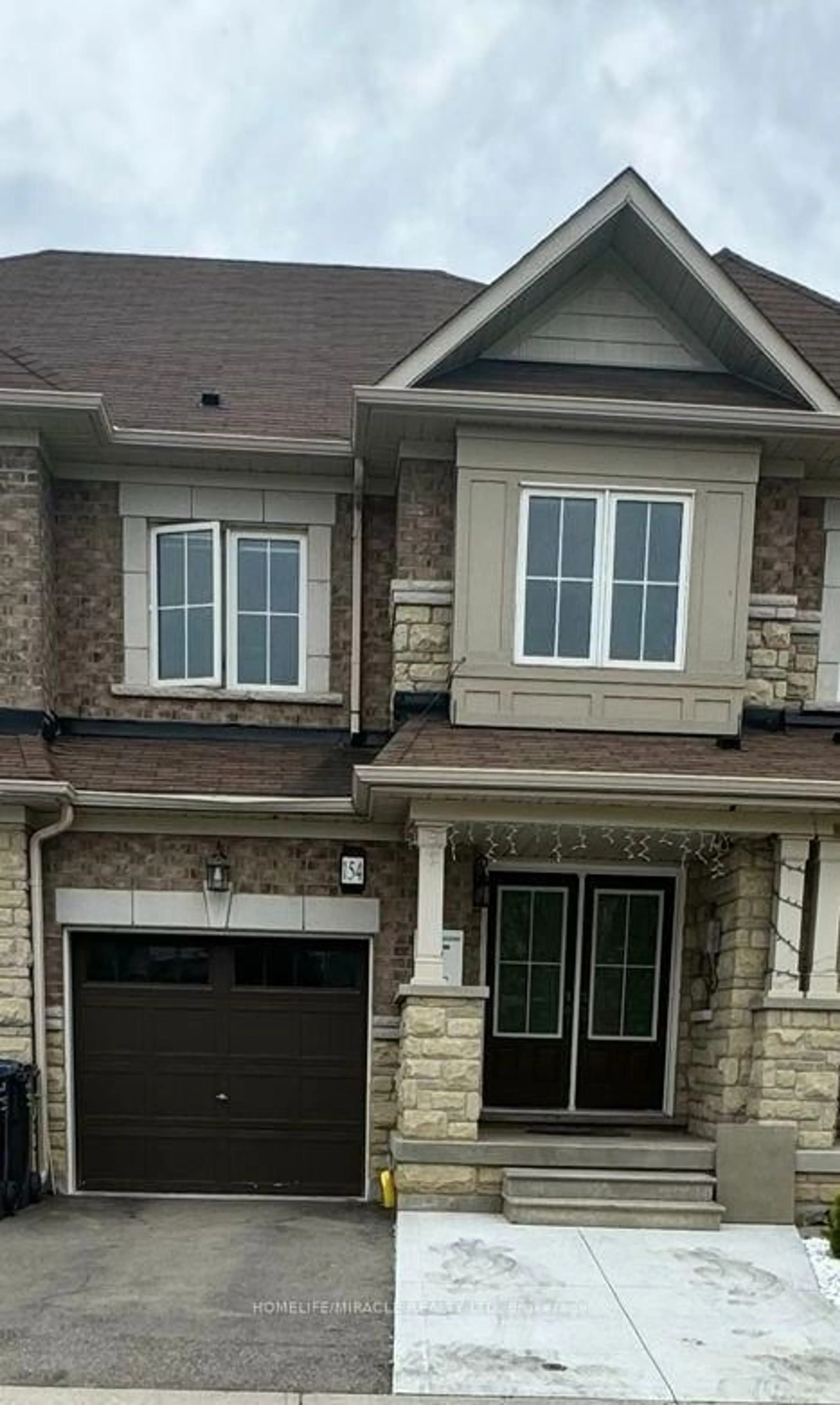 Home with brick exterior material, street for 154 Golden Springs Dr, Brampton Ontario L7A 4N7