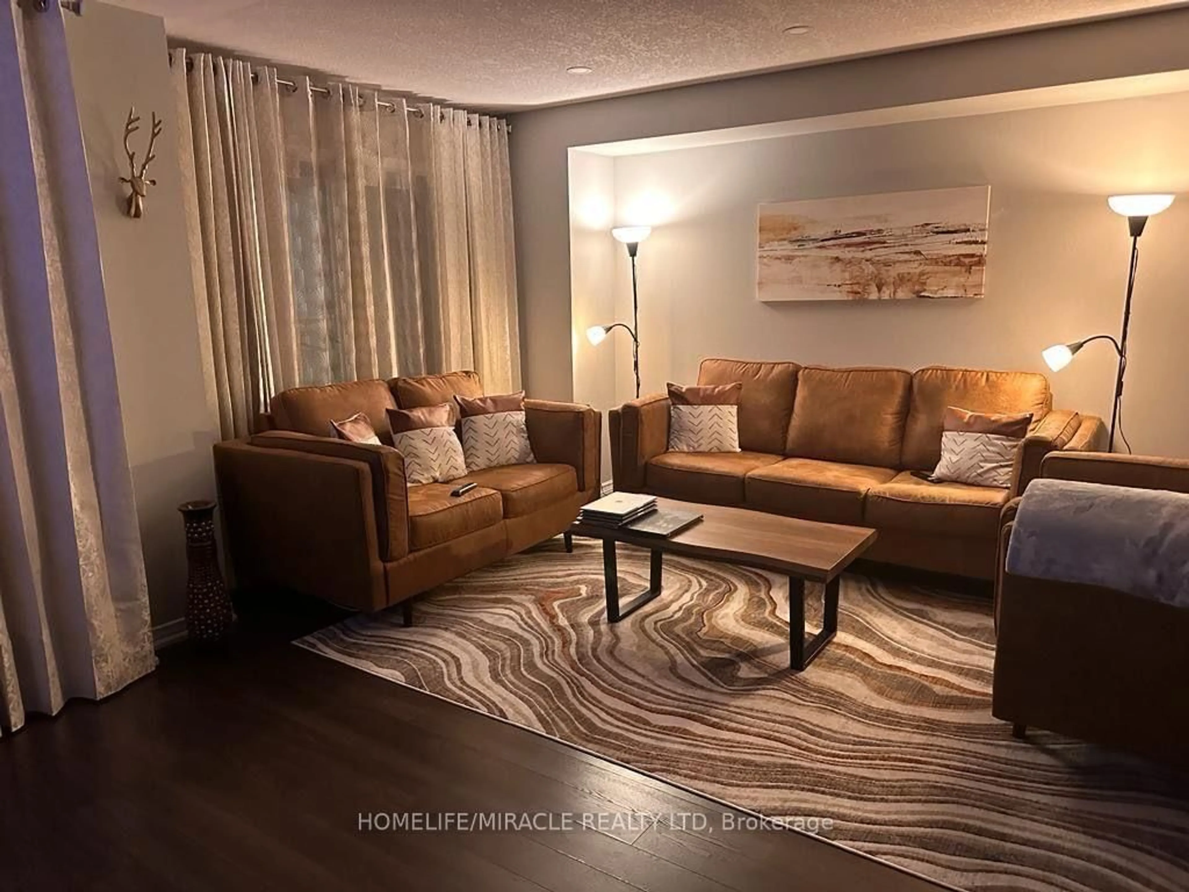Living room with furniture, unknown for 154 Golden Springs Dr, Brampton Ontario L7A 4N7