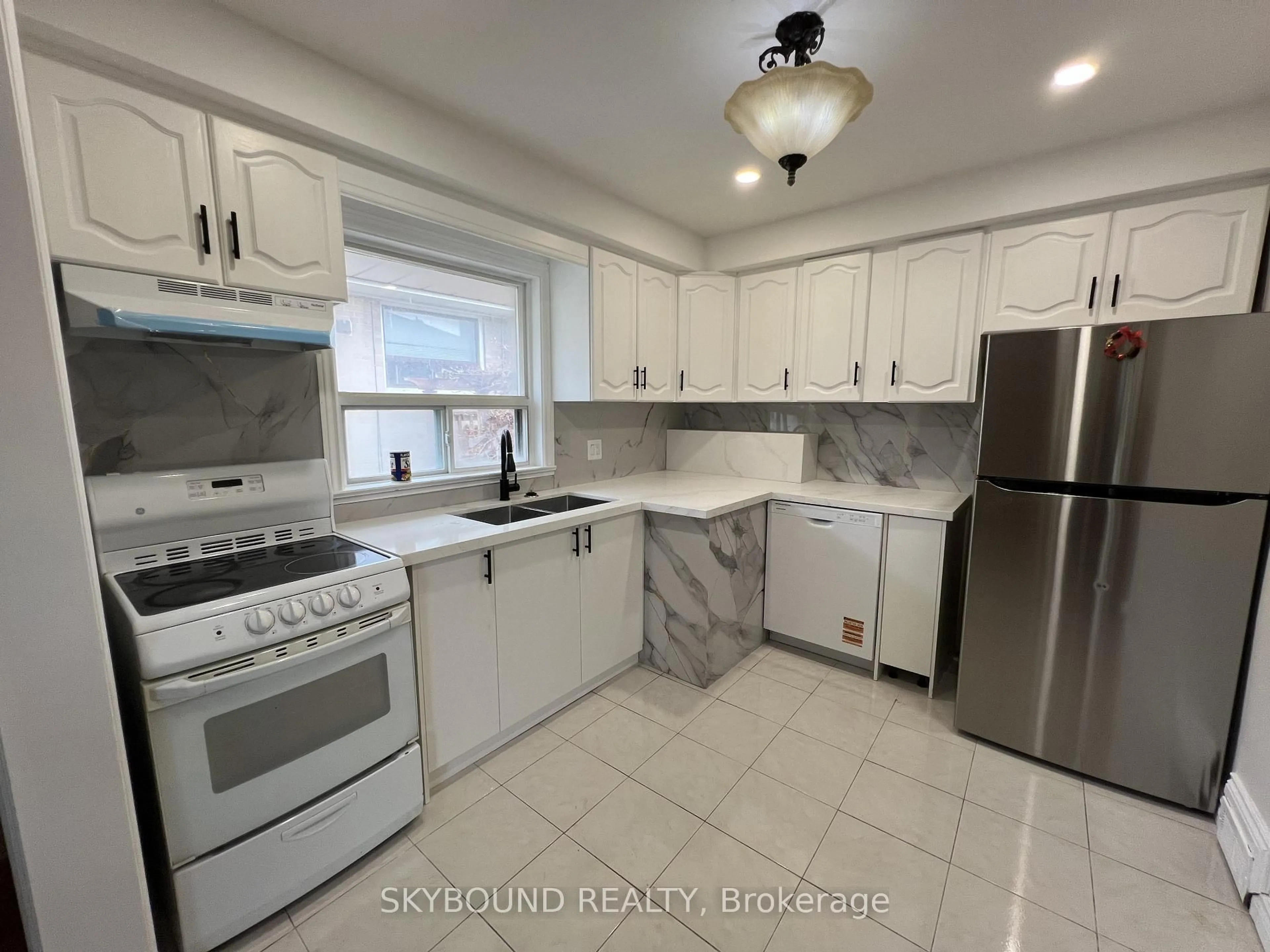 Standard kitchen, ceramic/tile floor for 33 Bradstock Rd, Toronto Ontario M9M 1M9