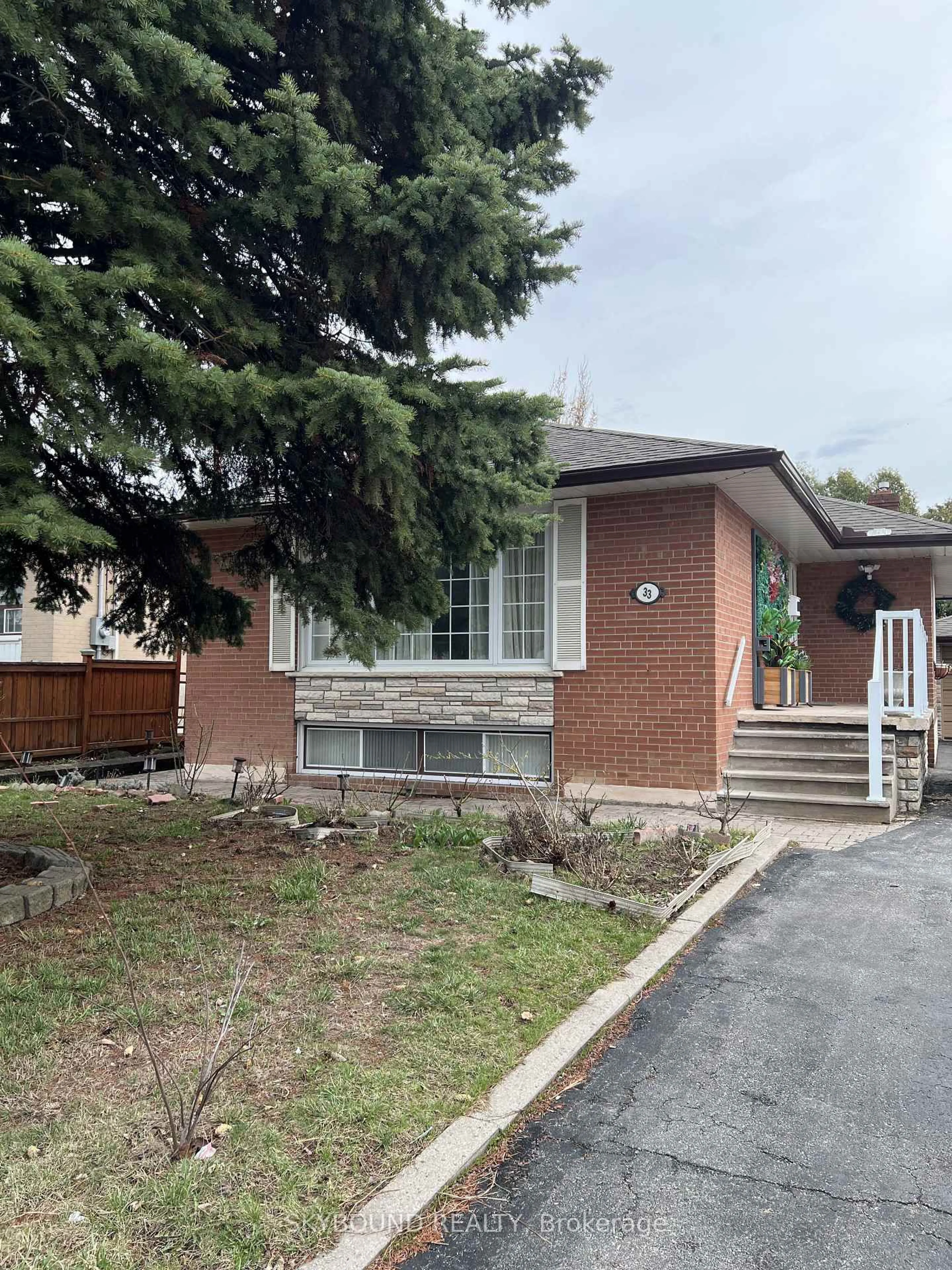 Home with brick exterior material, street for 33 Bradstock Rd, Toronto Ontario M9M 1M9