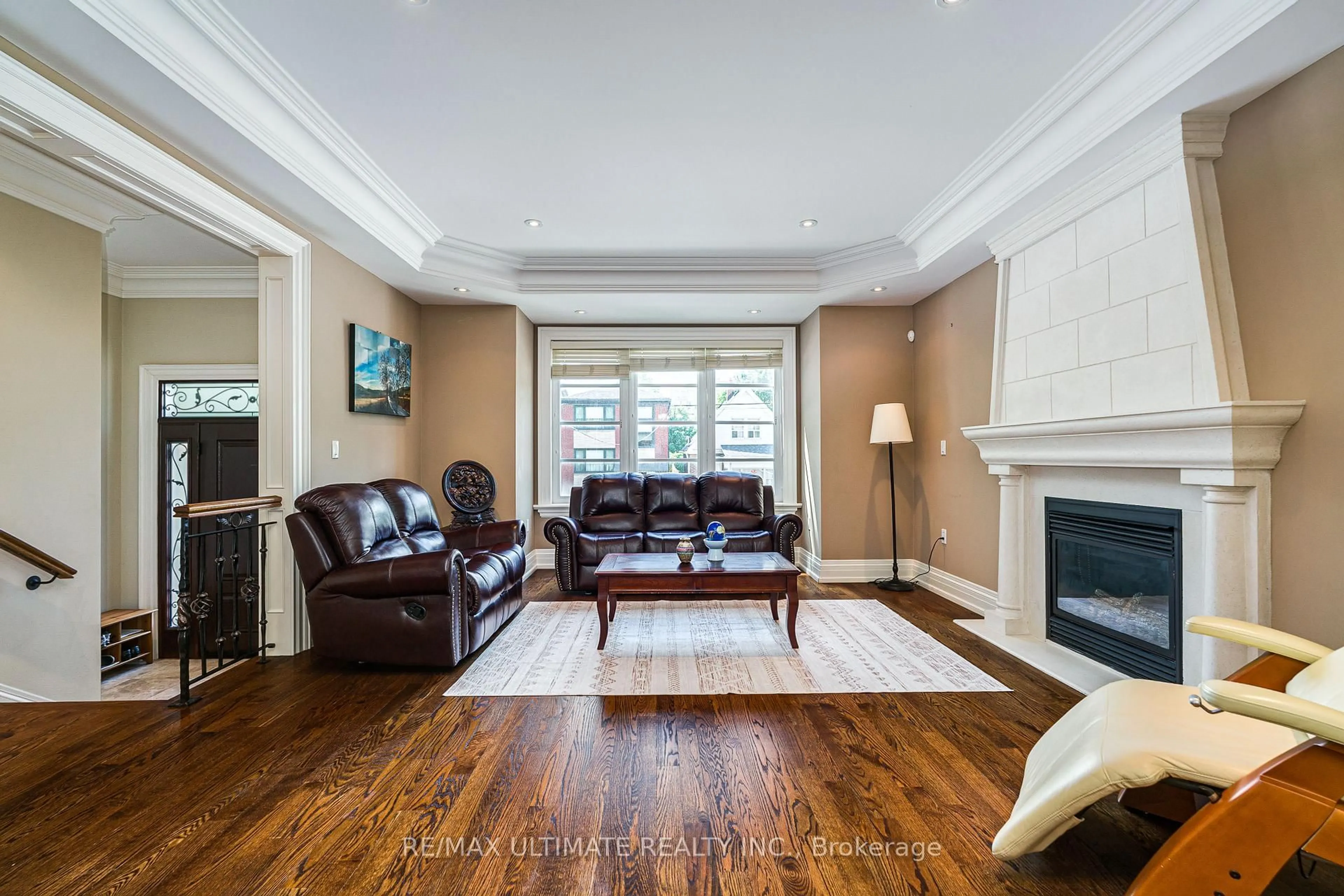 Living room with furniture, wood/laminate floor for 90 Howick Ave, Toronto Ontario M6N 1N1