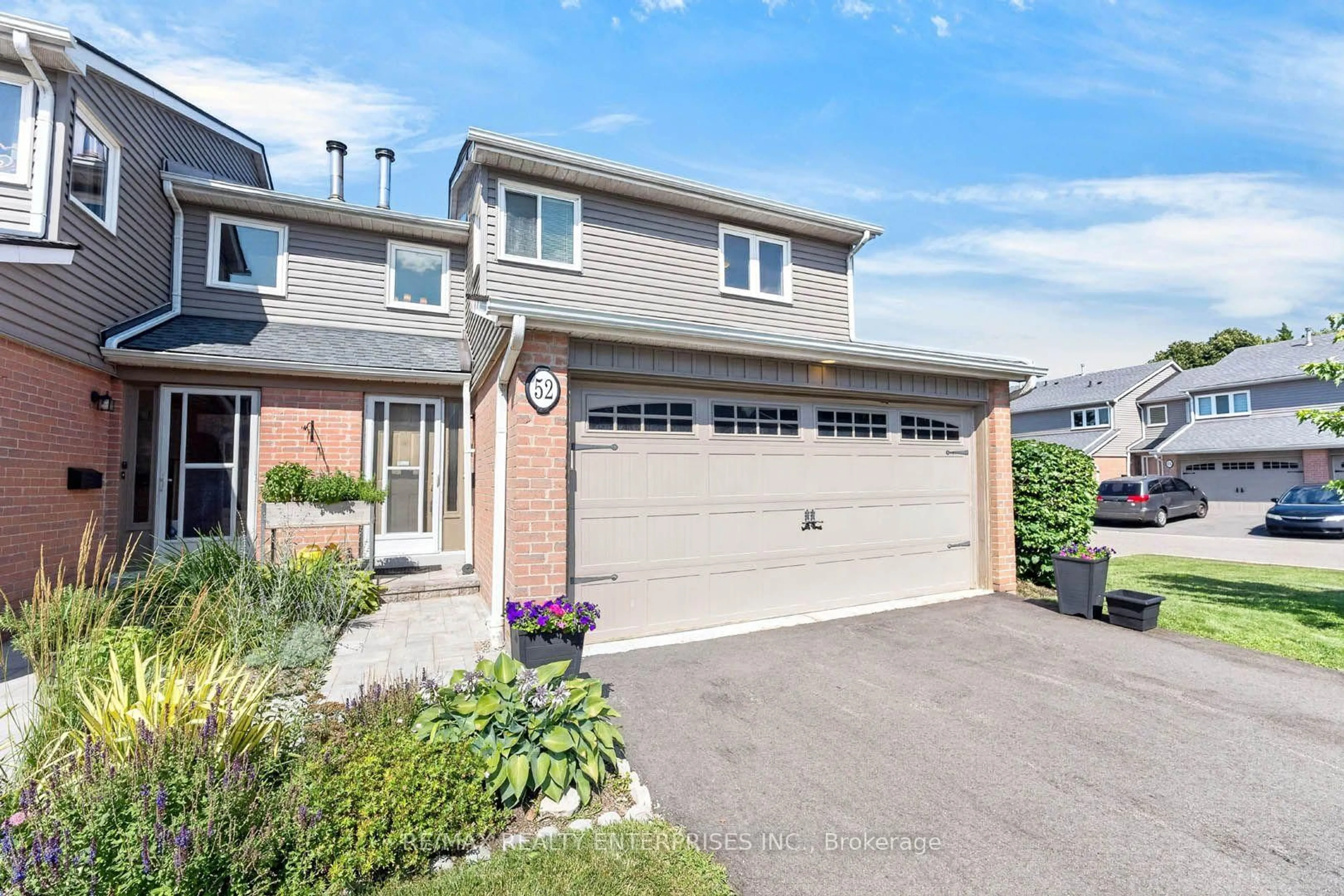 Home with brick exterior material, street for 3125 Fifth Line #52, Mississauga Ontario L5L 3S8