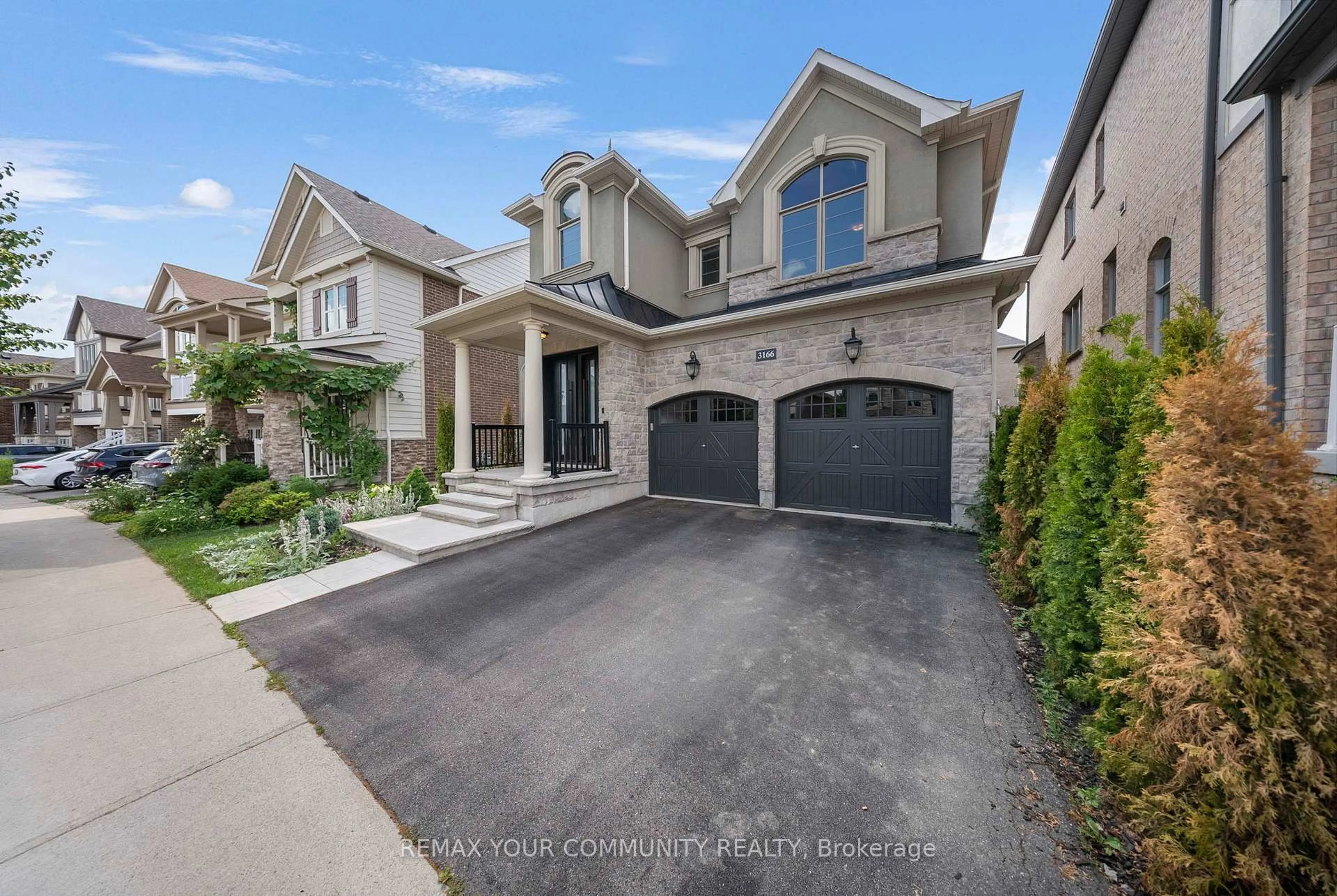 Home with brick exterior material, street for 3166 Carding Mill Tr, Oakville Ontario L6M 4M1